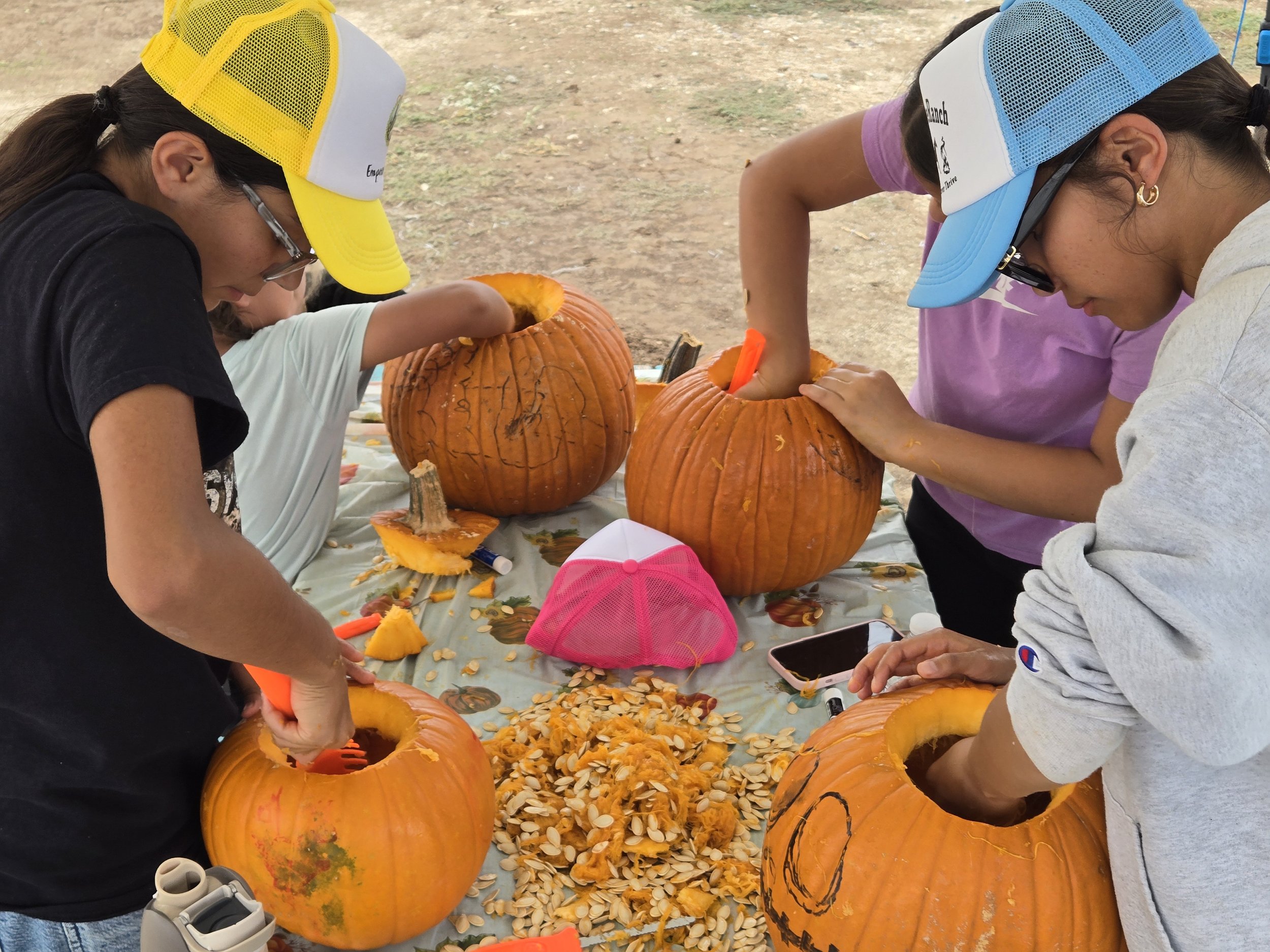 2025 fall camp almost done carving pumpkins.jpg