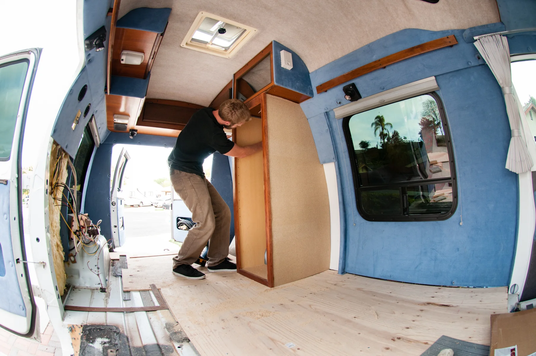 I tore out the entire interior and custom-built everything to fit my need for long-term travel.