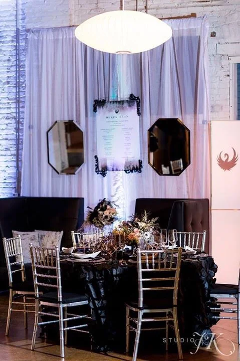 Photo by Studio JK Photography, Lighting and Decor by Pink Monkey Solutions, Highlights Colorado, and Lighting and Design by Scott, Furnishings by CORT Events, Vignette Concept and Design and Floral by Pro Chic Events, Signage by Veronica Preston Design, Tableware by AllWell Rents, Co-Direction by Platinum Weddings and Events-Denver