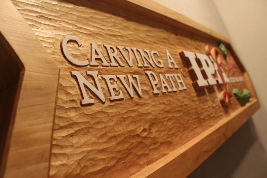 Carving a New Path, Wooden Sign