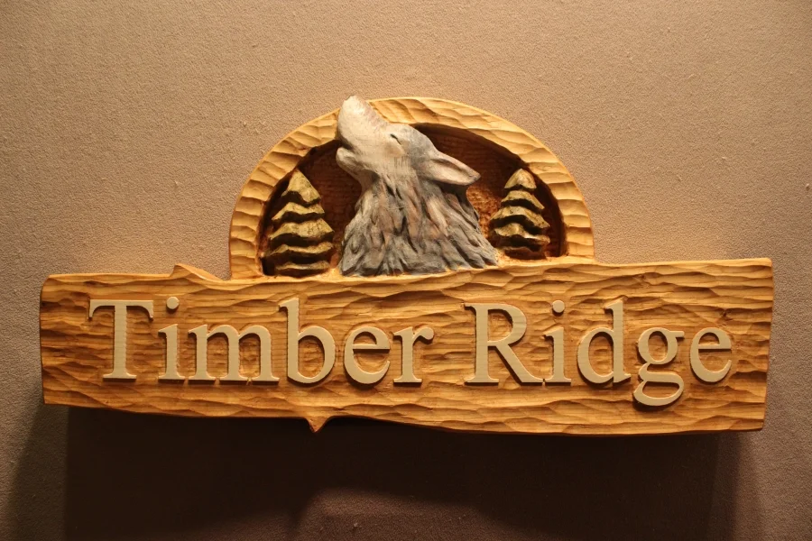 Custom carved wolf sign by Lazy River Studio
