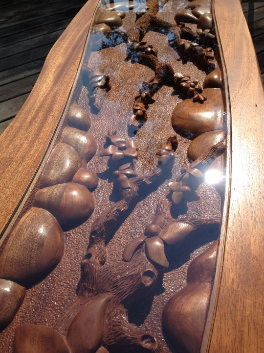 handmade, hand carved coffee table