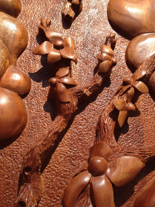 Hand carved floral by Lazy River Studio