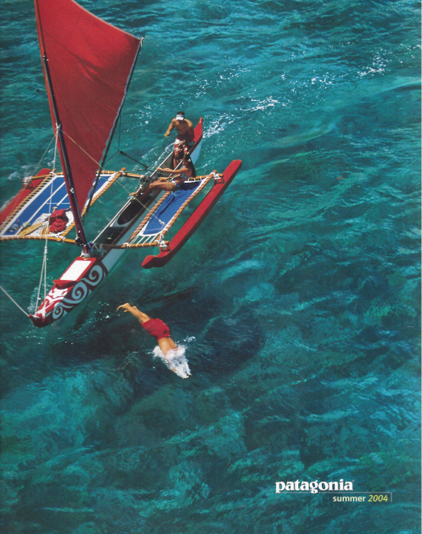Cover shot of Mike Field and his sailing canoe off the Big Island.