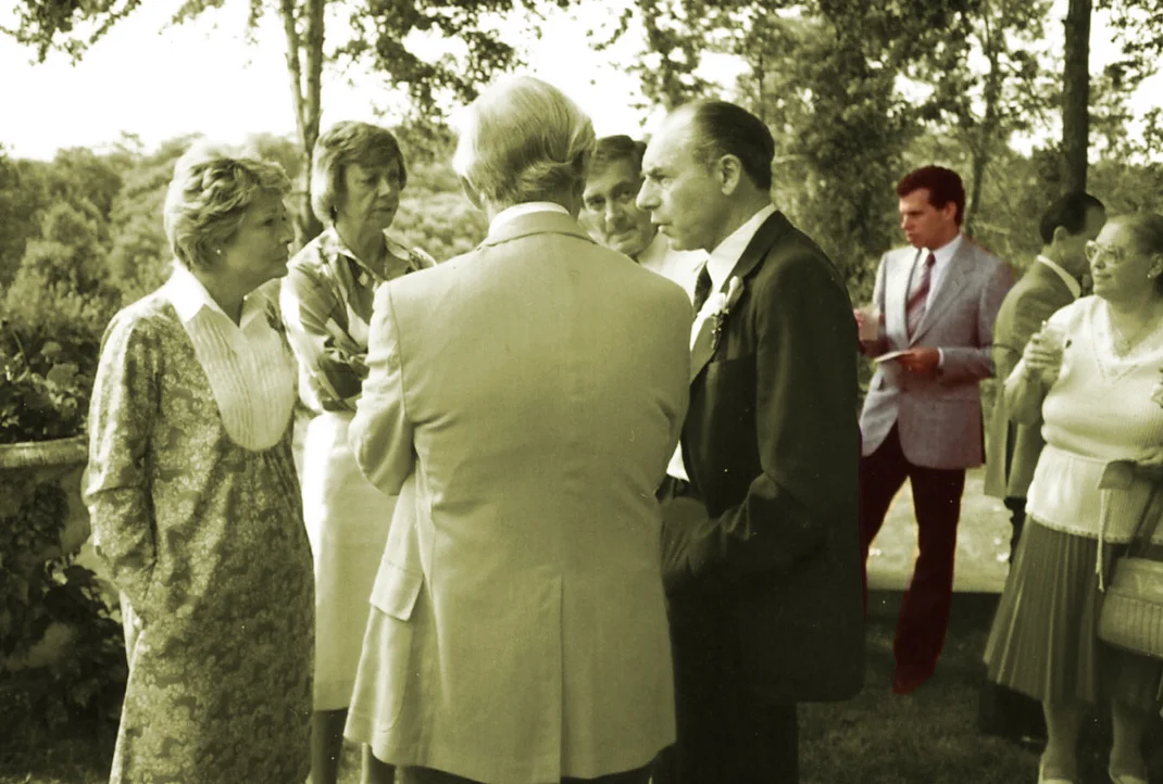 Reginald Miller's engagement party in Southern Pines NC with Jerrold Green (in color) in the background circa 1989