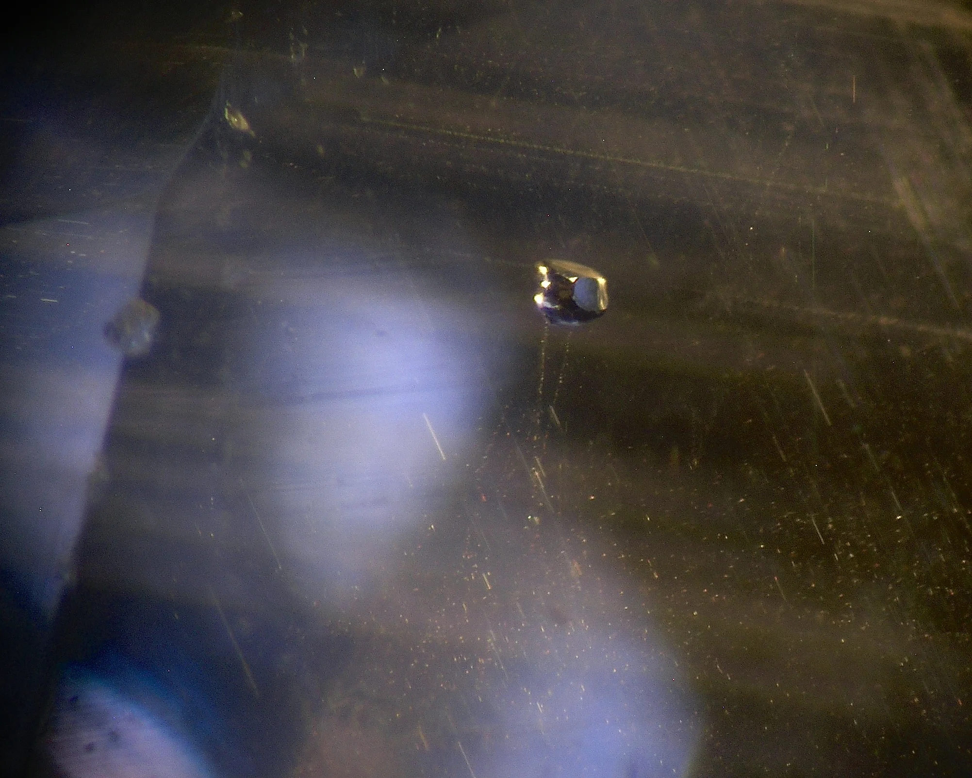 A negative crystal embedded within the 16.13 carat Ceylon sapphire