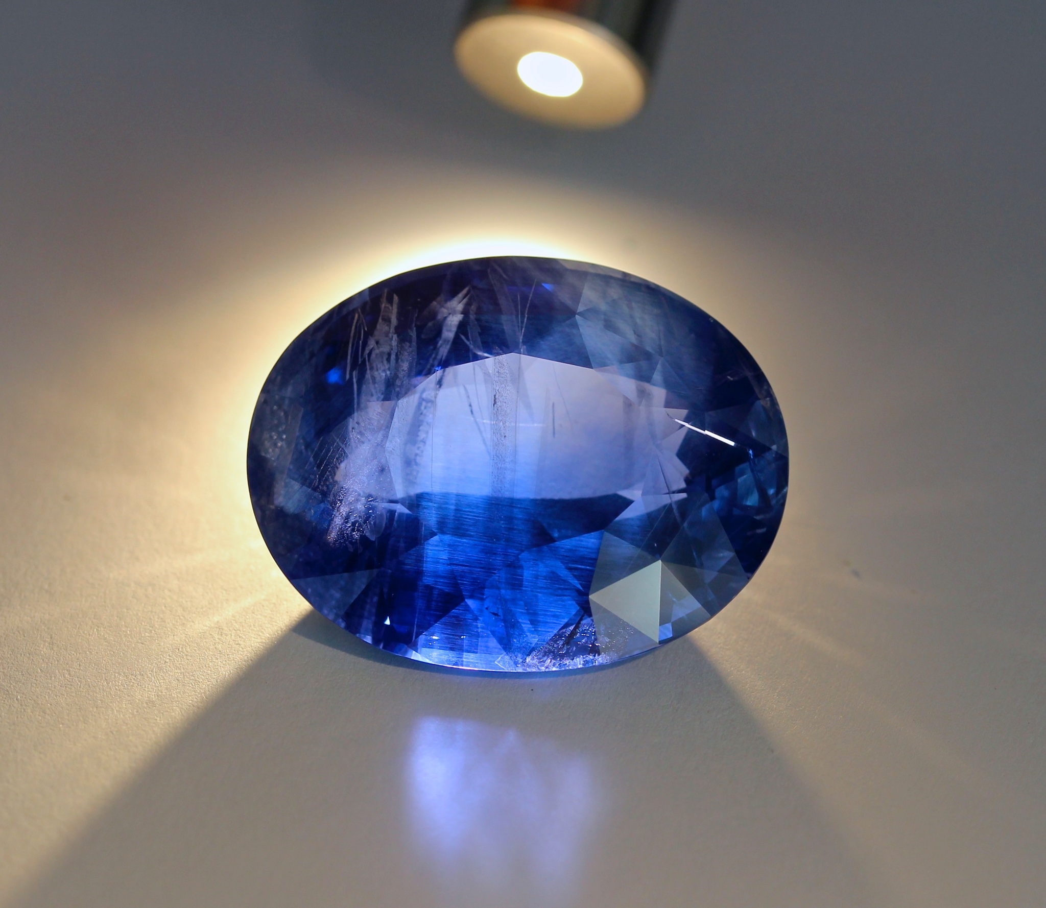 100 carat + sapphire with twinning lines that indicate the joining of two crystals