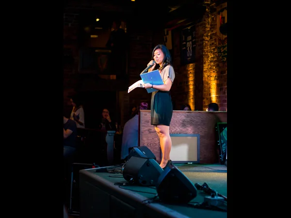 Rainbow Choi announces the program during during HOPE International Development Agency fundraising event to benefit children orphaned by AIDS in Ethiopia, held at The Blarney Stone Pub, Vancouver, BC, Canada on November 3, 2013.