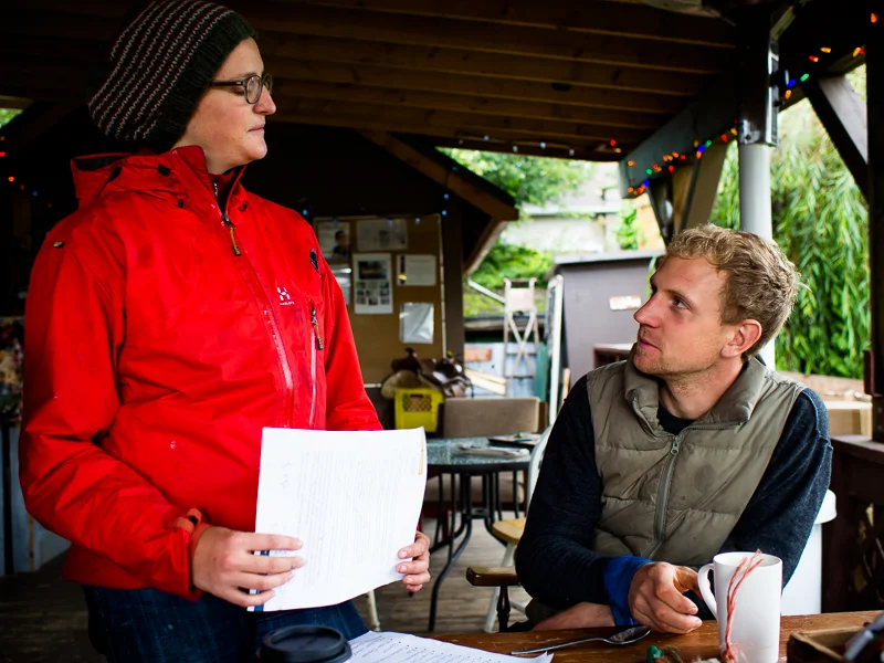 Judith, who's been working on the Southlands Heritage Farm for the past two months, discusses upcoming Sunday Market with Jordan Maynard, Southlands Farm general manager and educator, Vancouver, BC, Canada on September 29, 2013. Photo: Art Zaratsyan