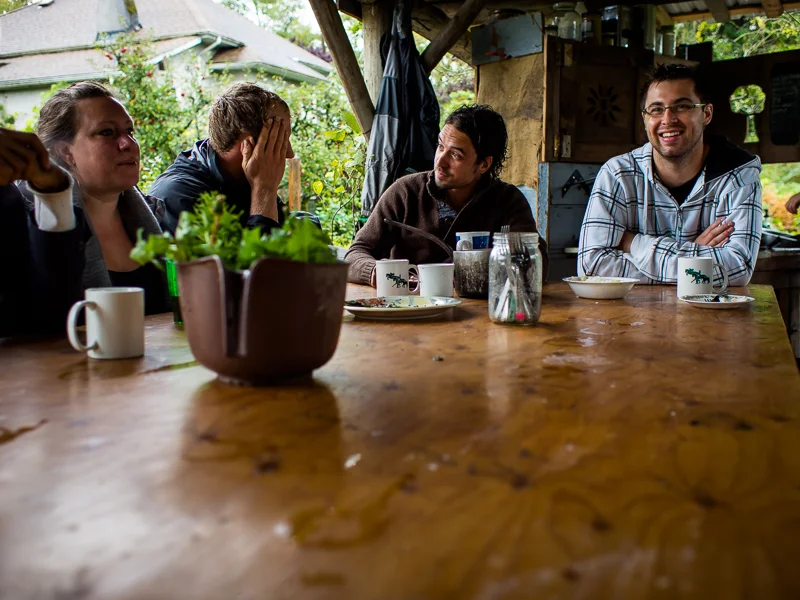 Dozē volunteers socialize with the educators and guests over coffee at Southlands Heritage Farm, Vancouver, BC, Canada on September 29, 2013. Photo: Art Zaratsyan