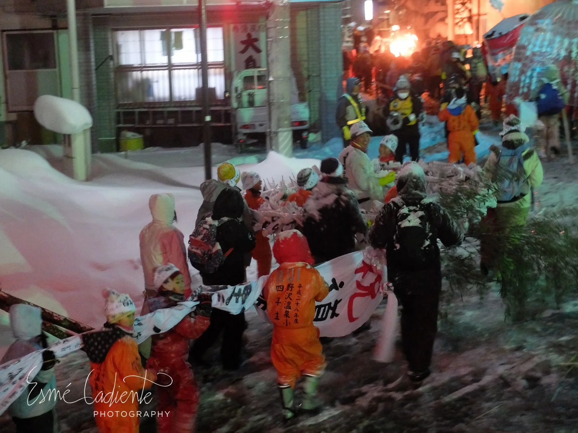 The Fire Festival begins with a parade that snakes through the streets of Nozawa Onsen.
