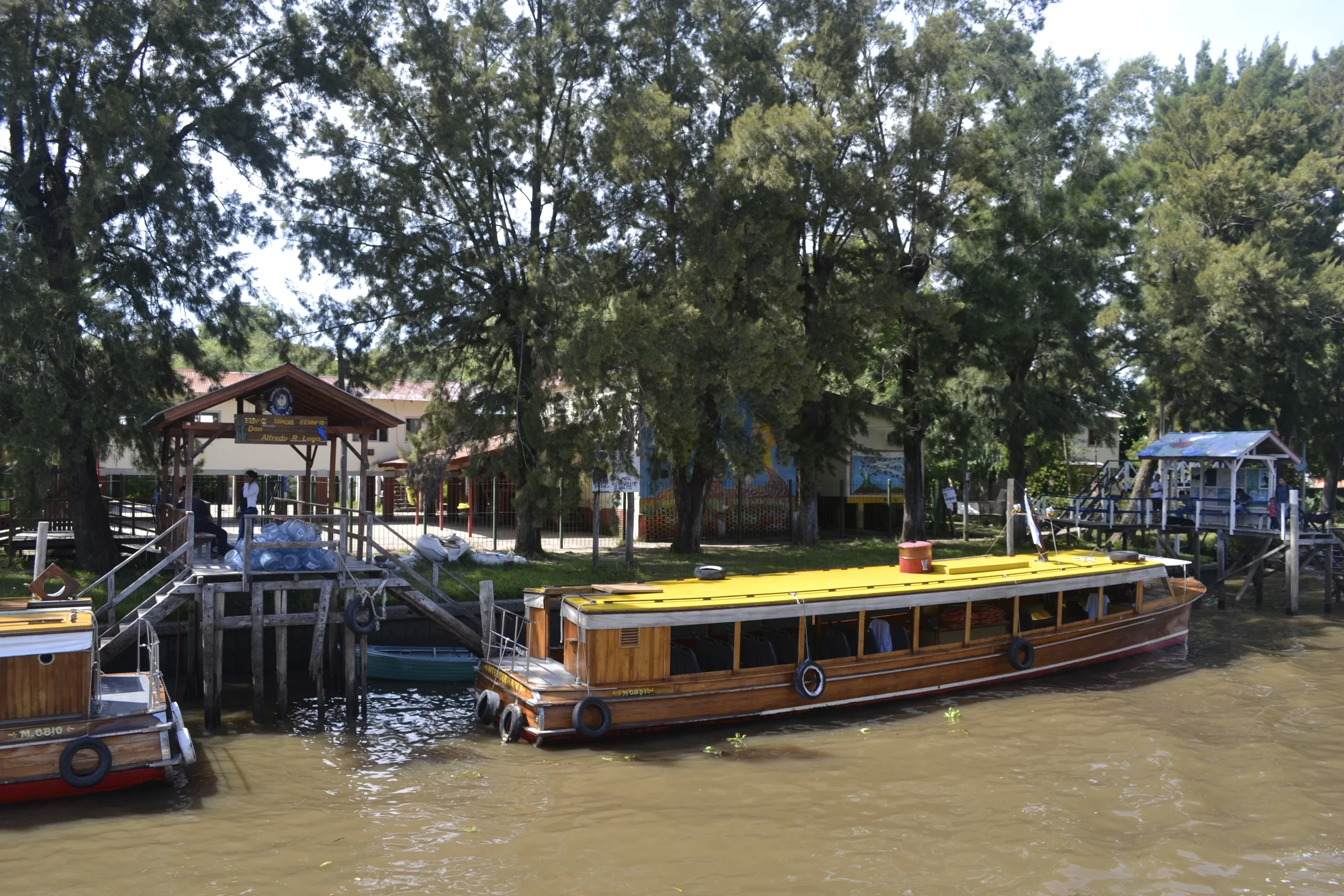 School on the river... that's a boat bus!