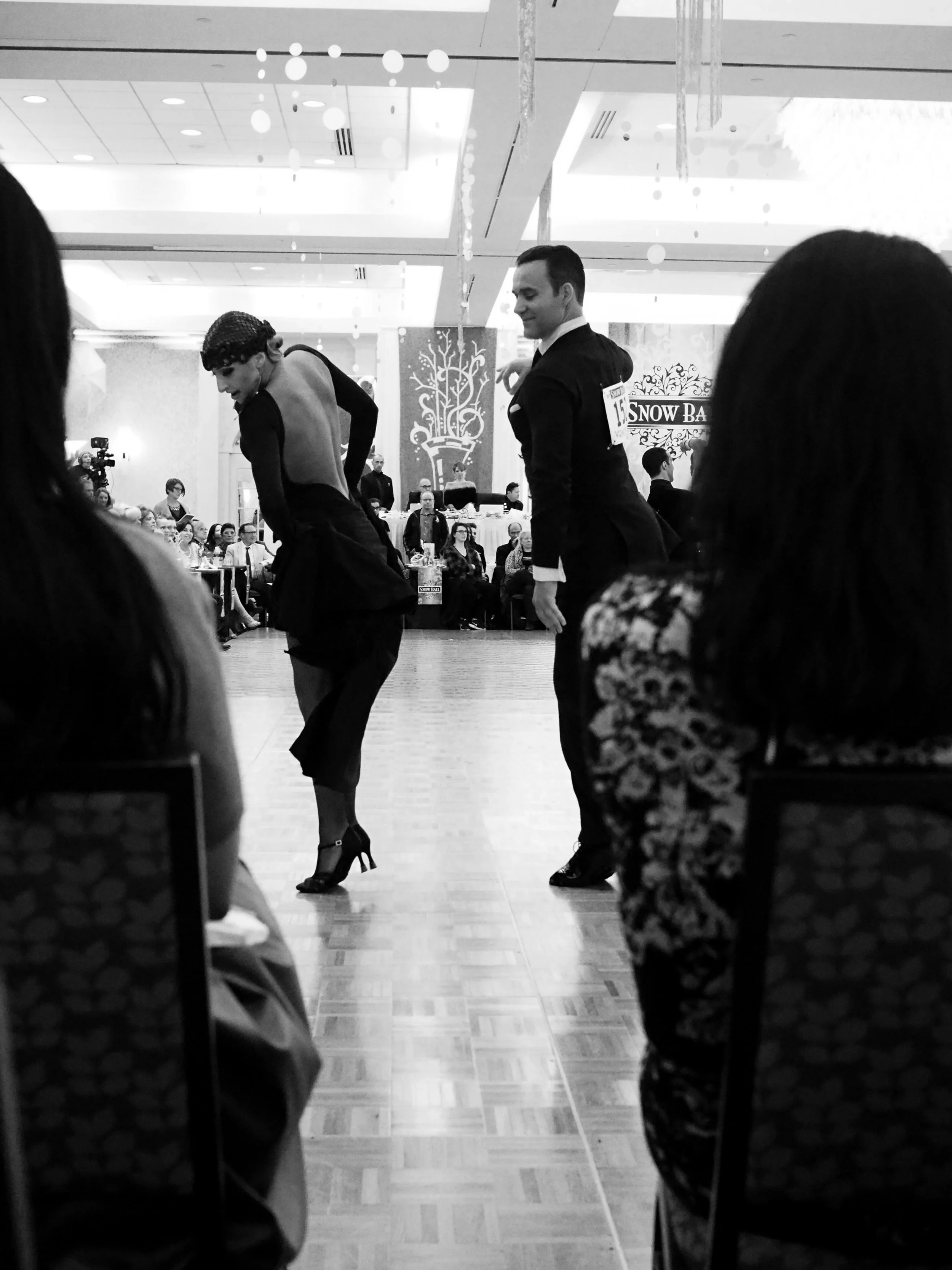 On their toes. (They won second place. But I thought they should have been first.