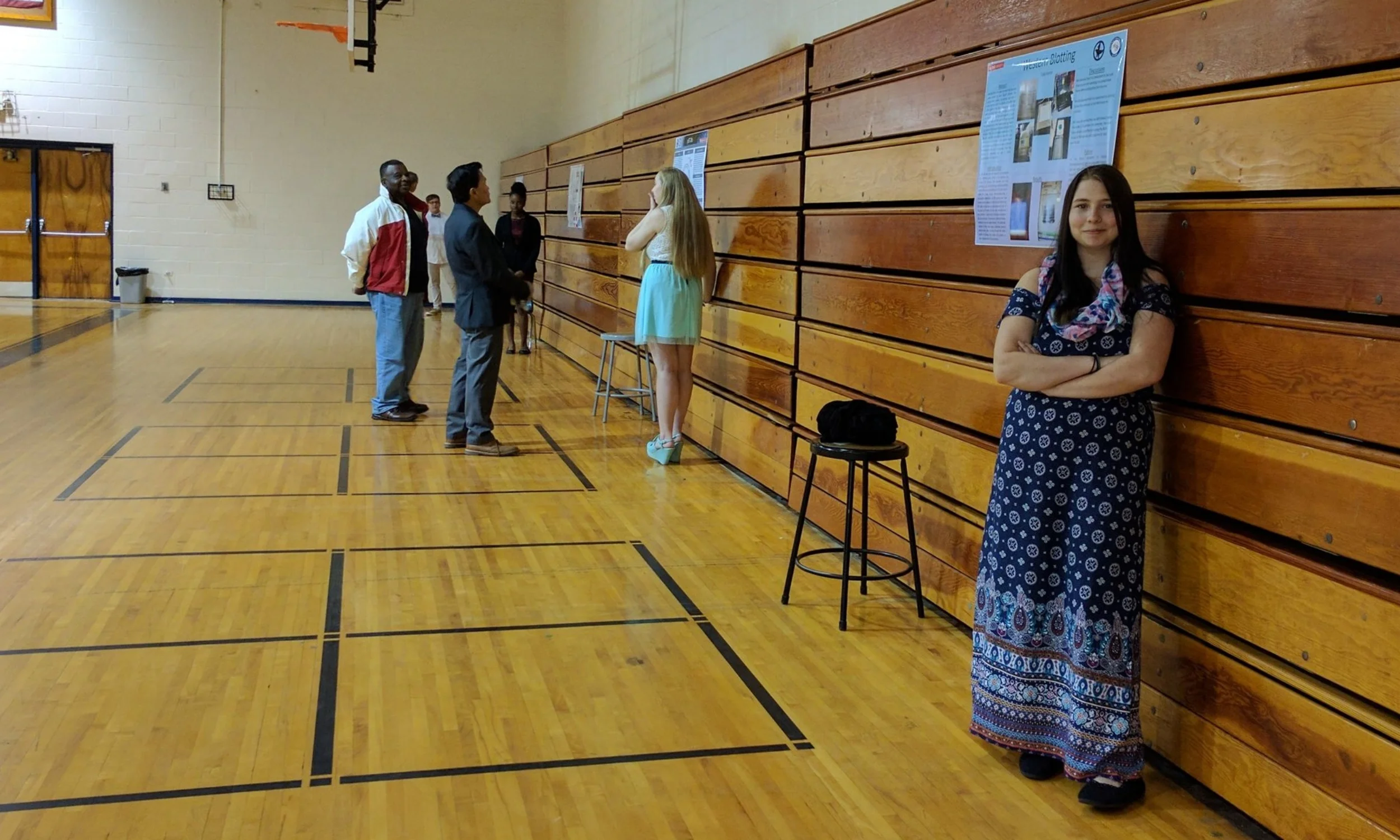  Cody thinking about how this time next year she'll be finishing her first year at NC State, while Haley describes plasmids to Bobby Occena and Barry McGlone from the Bertie County Board of Education. 