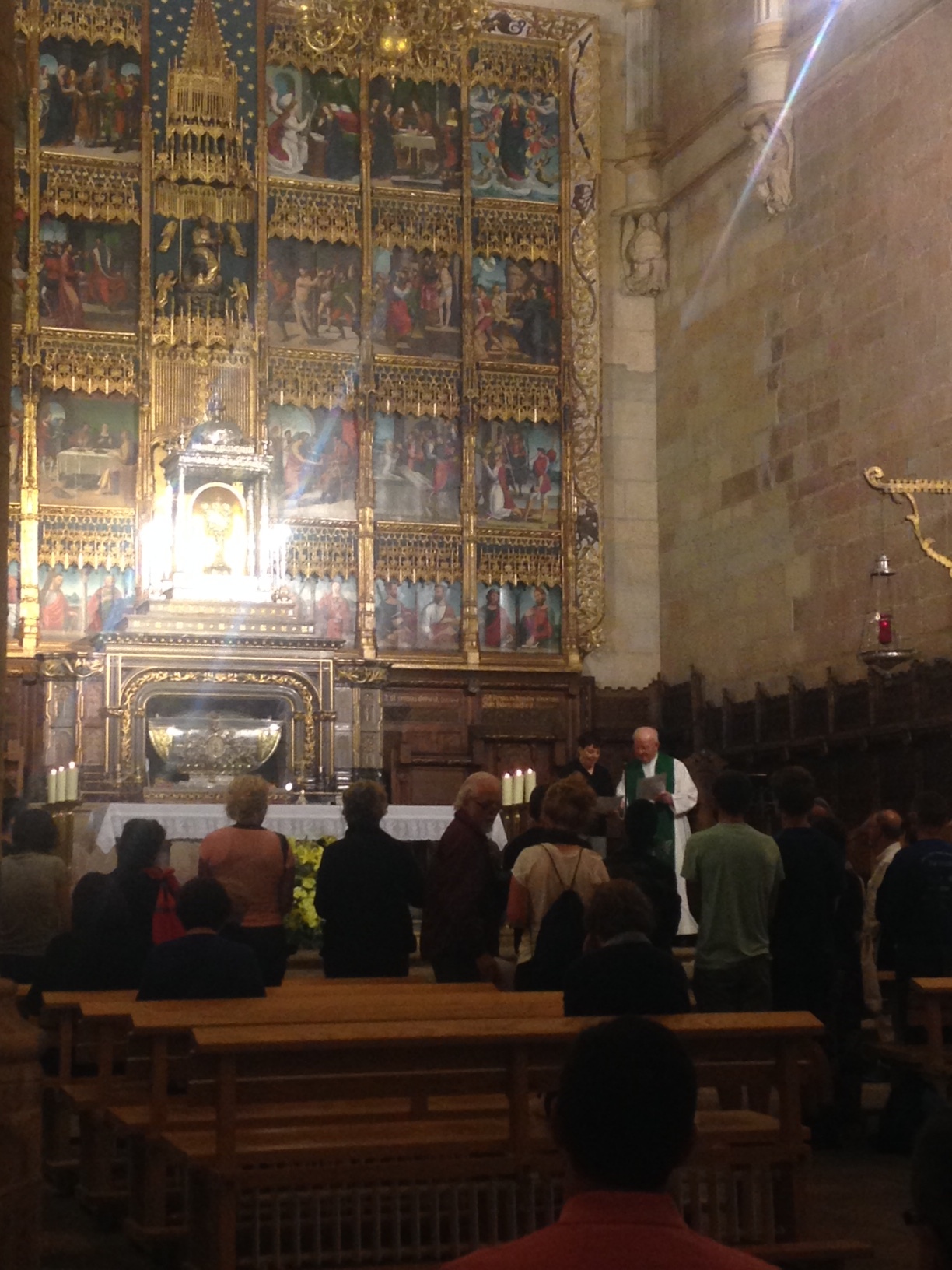 The camino provides...because I visited S. Isidoro, I was provided with a very nice Scottish couple who I'd seen often and they invited me for tapas. First, I spied on the pilgrim mass which was ending as I arrived. Each place does it a little differently, but at the end of mass, the priest invites the pilgrims to stand or approach and offers a blessing. Here, he's also giving a history of the Church as well. My favorite pilgrim's mass was in Estella, where the priest seemed to speak every pilgrim's language and had a holy card for each of us.