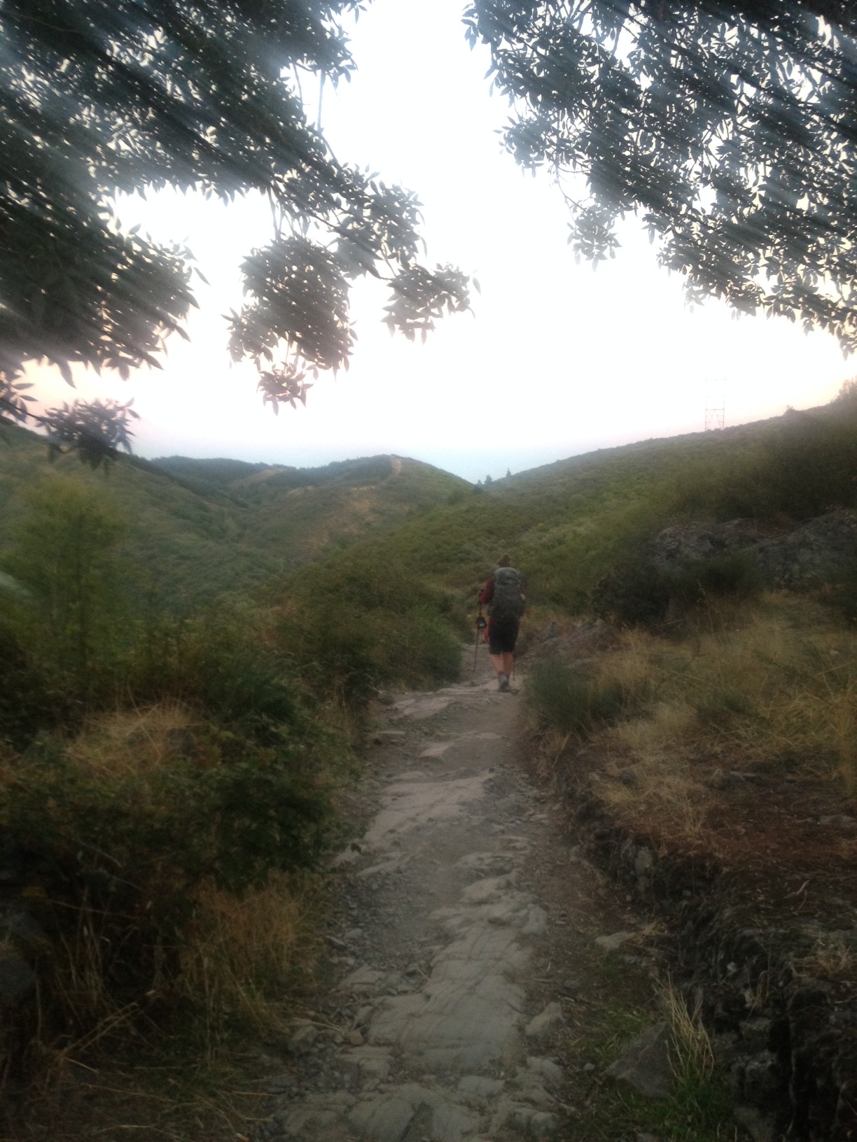 My camera is so dirty, I now have a nice Glamor Shots soft focus going on as we leave, climbing down from Reigo in the dark for nearly an hour before the valley began to fill with early morning light.