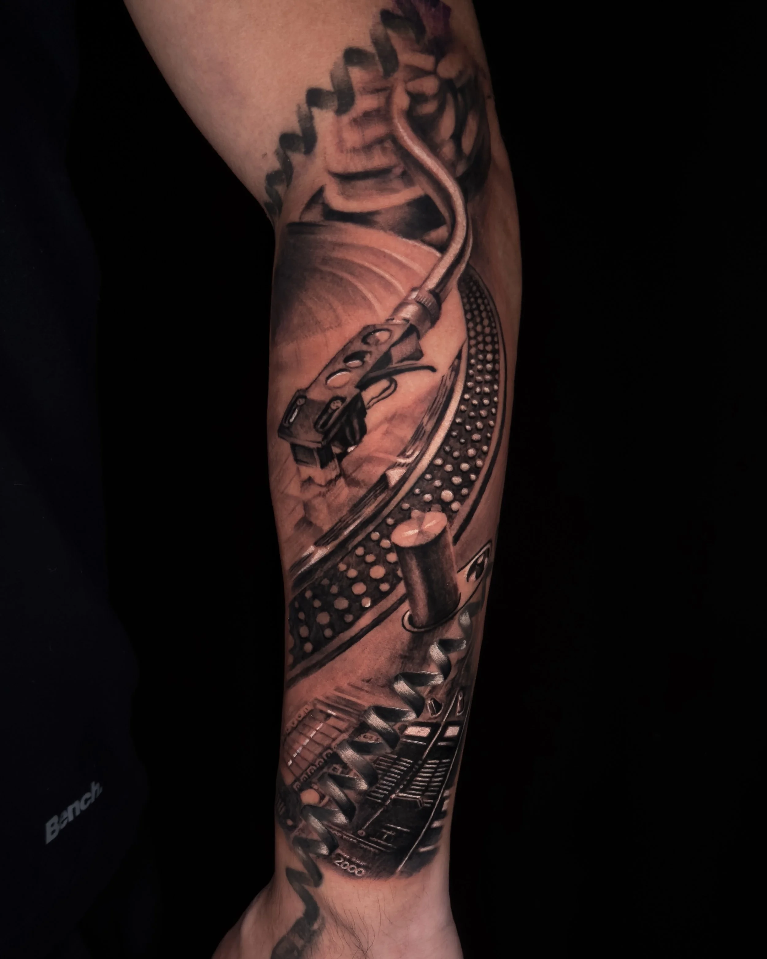 Best_tattoo_shop_toronto_black_and_grey_realism_dj_record_player.JPG