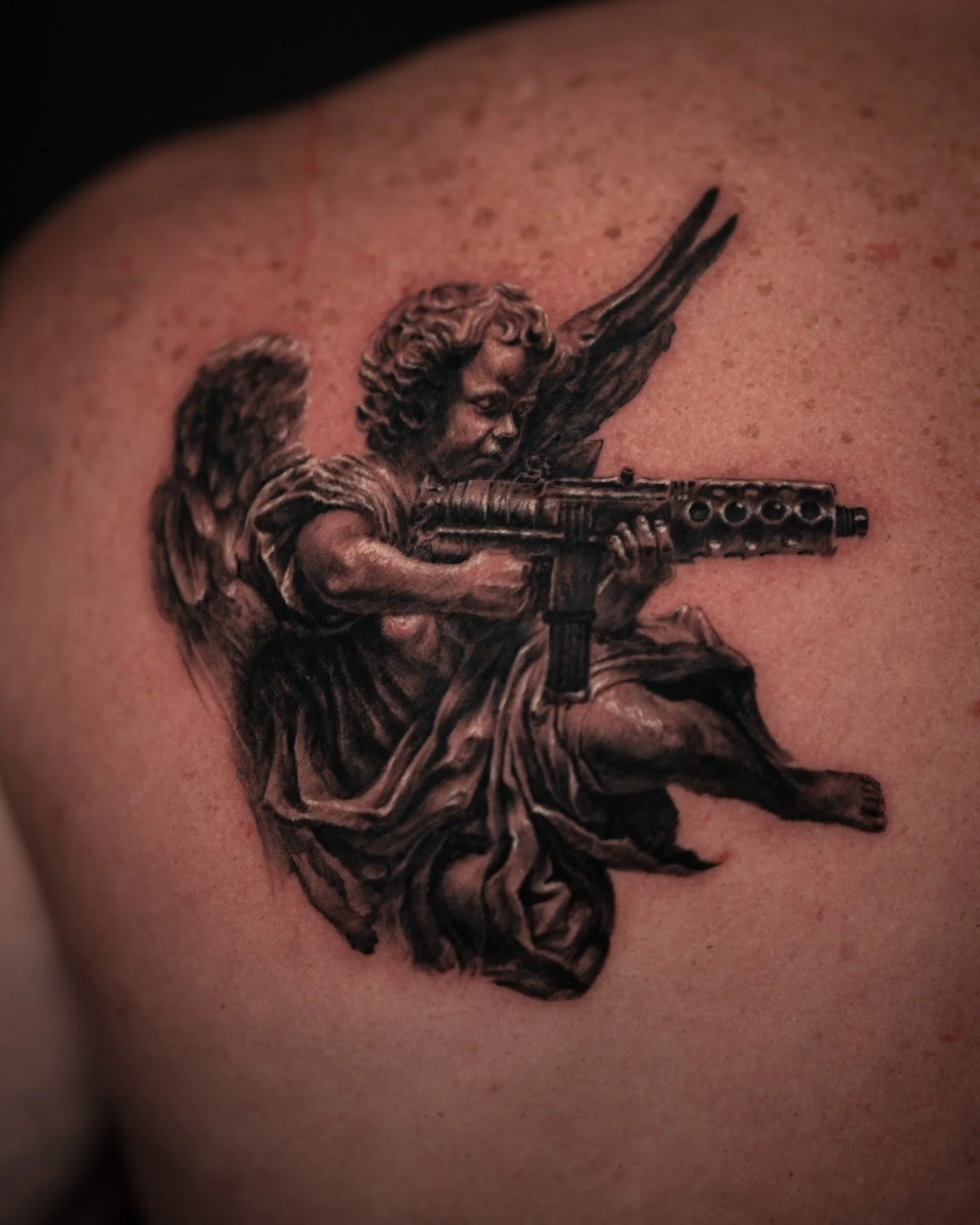 small-angel-gun-tattoo-toronto.JPG