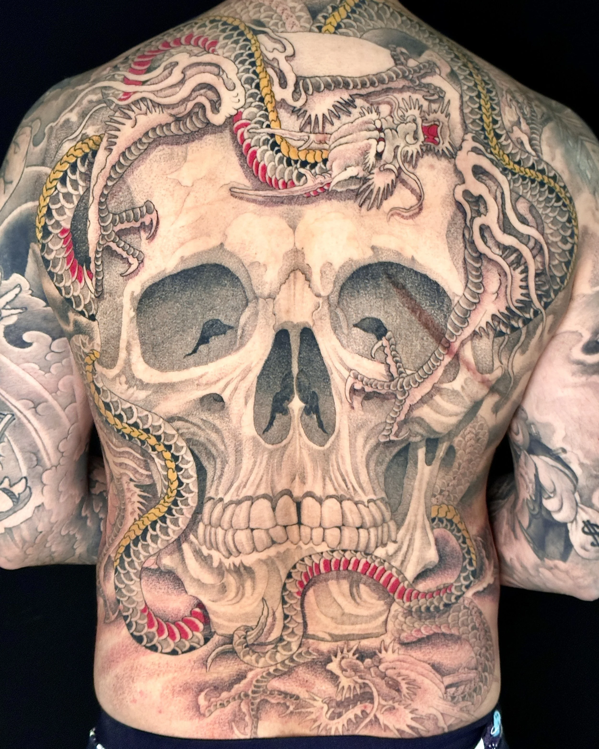 best-tattoo-shop-toronto-skull-dragon-tattoo.jpg