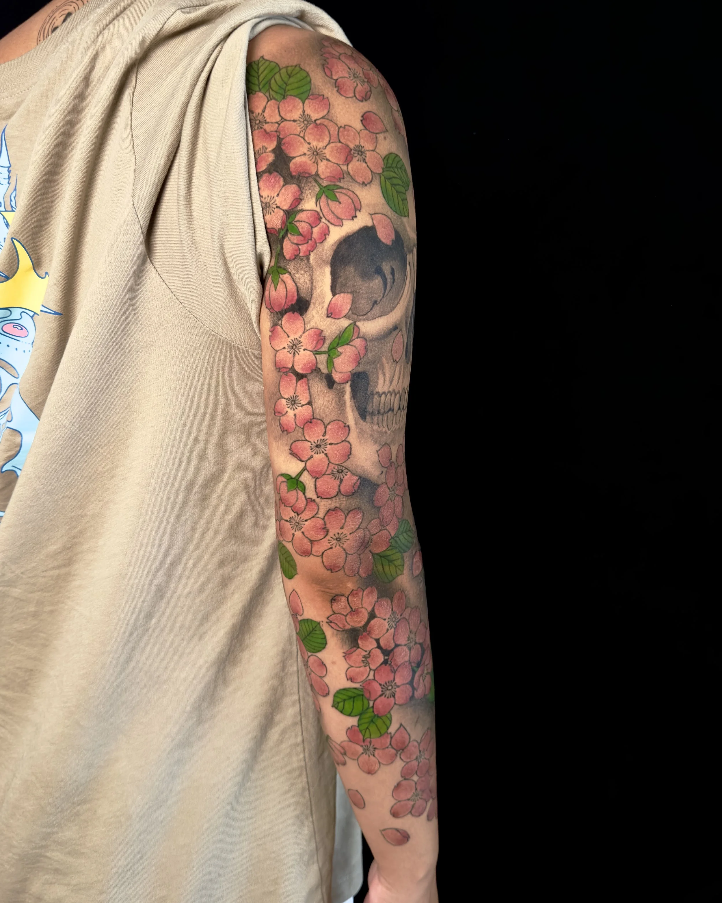 best-tattoo-shop-toronto-skull-flowers-tattoo.jpg