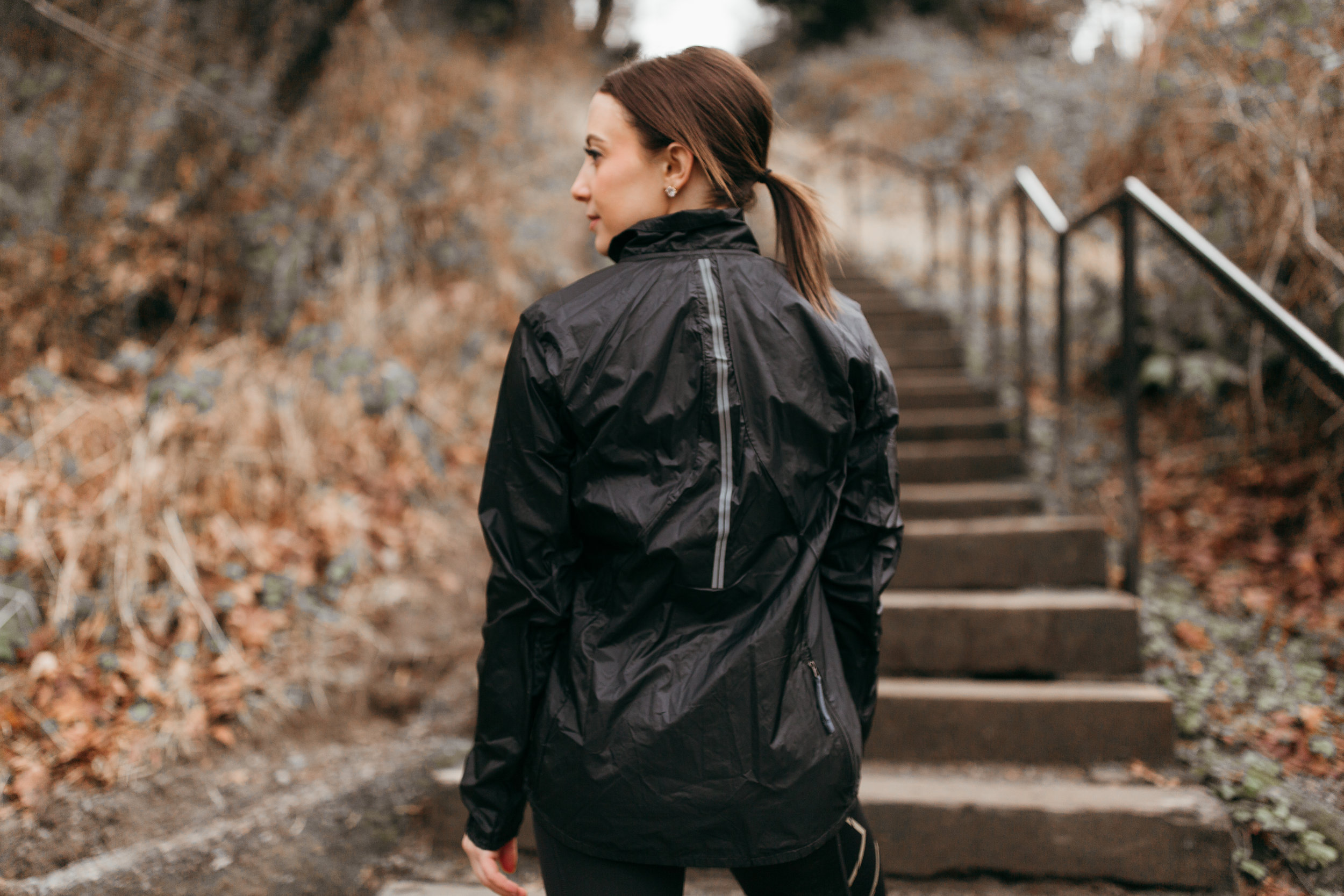 brooks running jacket black