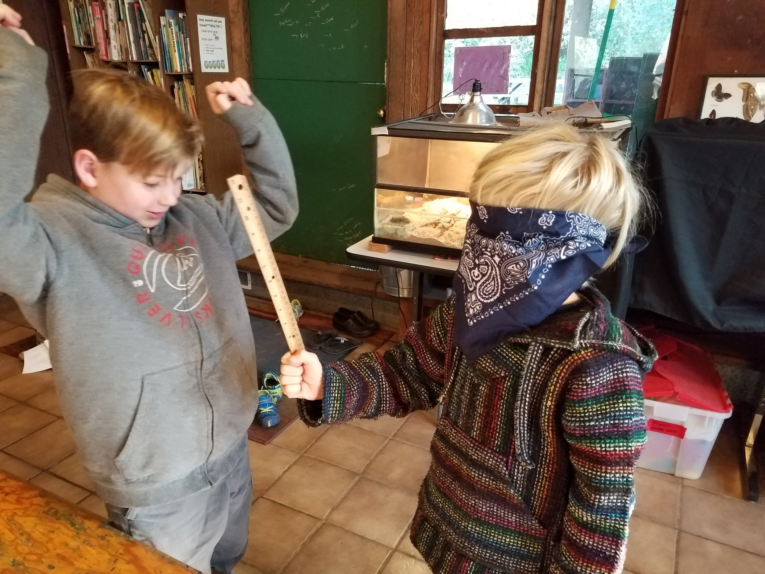 This is not a hold up :) The object is to catch the dropping ruler on a verbal cue rather than visual and compare reaction times.