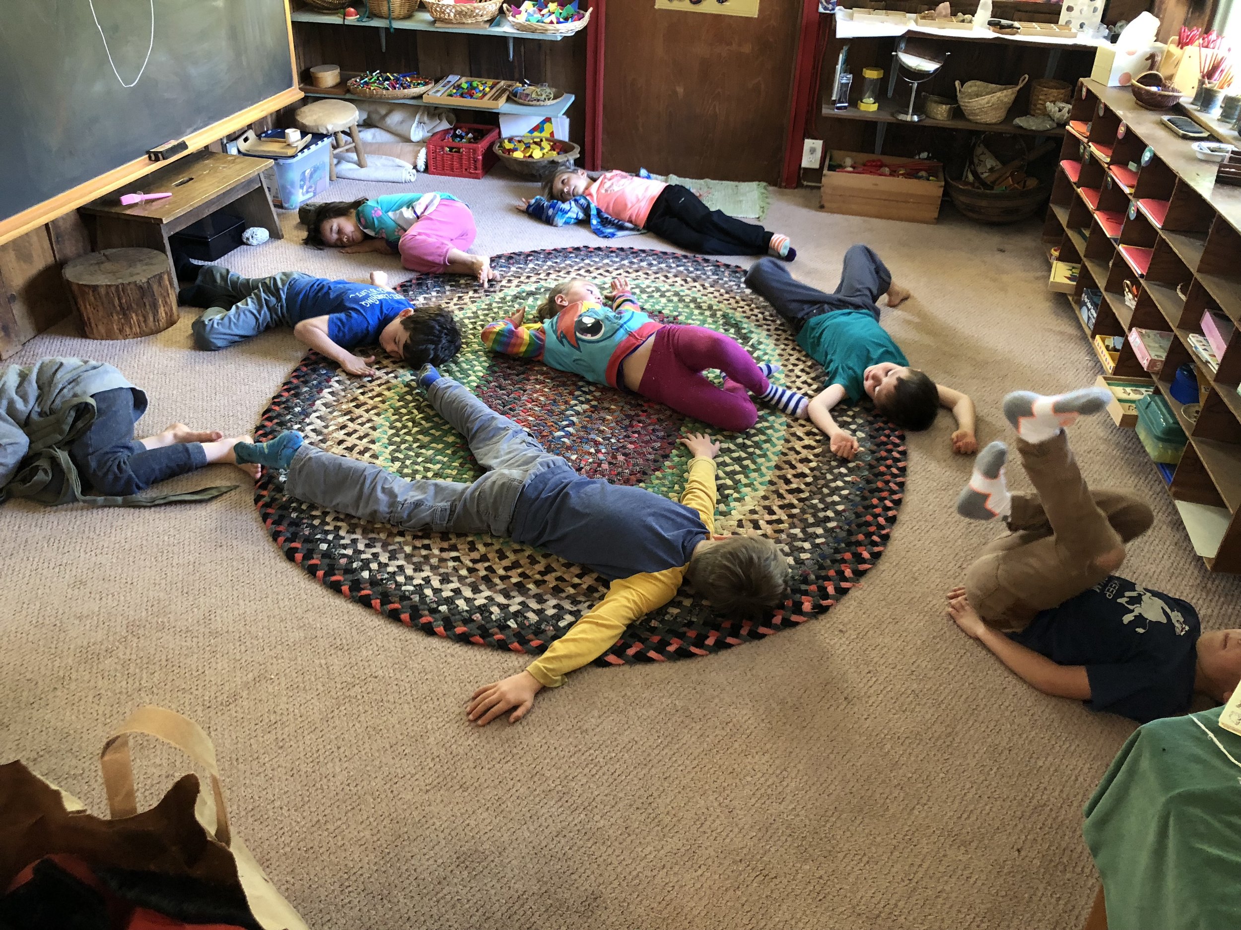 And here are the kids in various states of repose while Shana led them through a guided mediation.