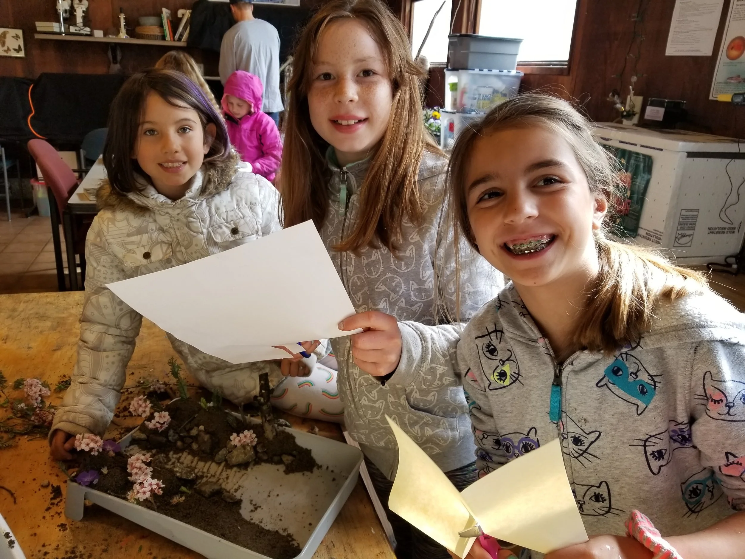 These girls made a candy factory to be placed in their watershed.