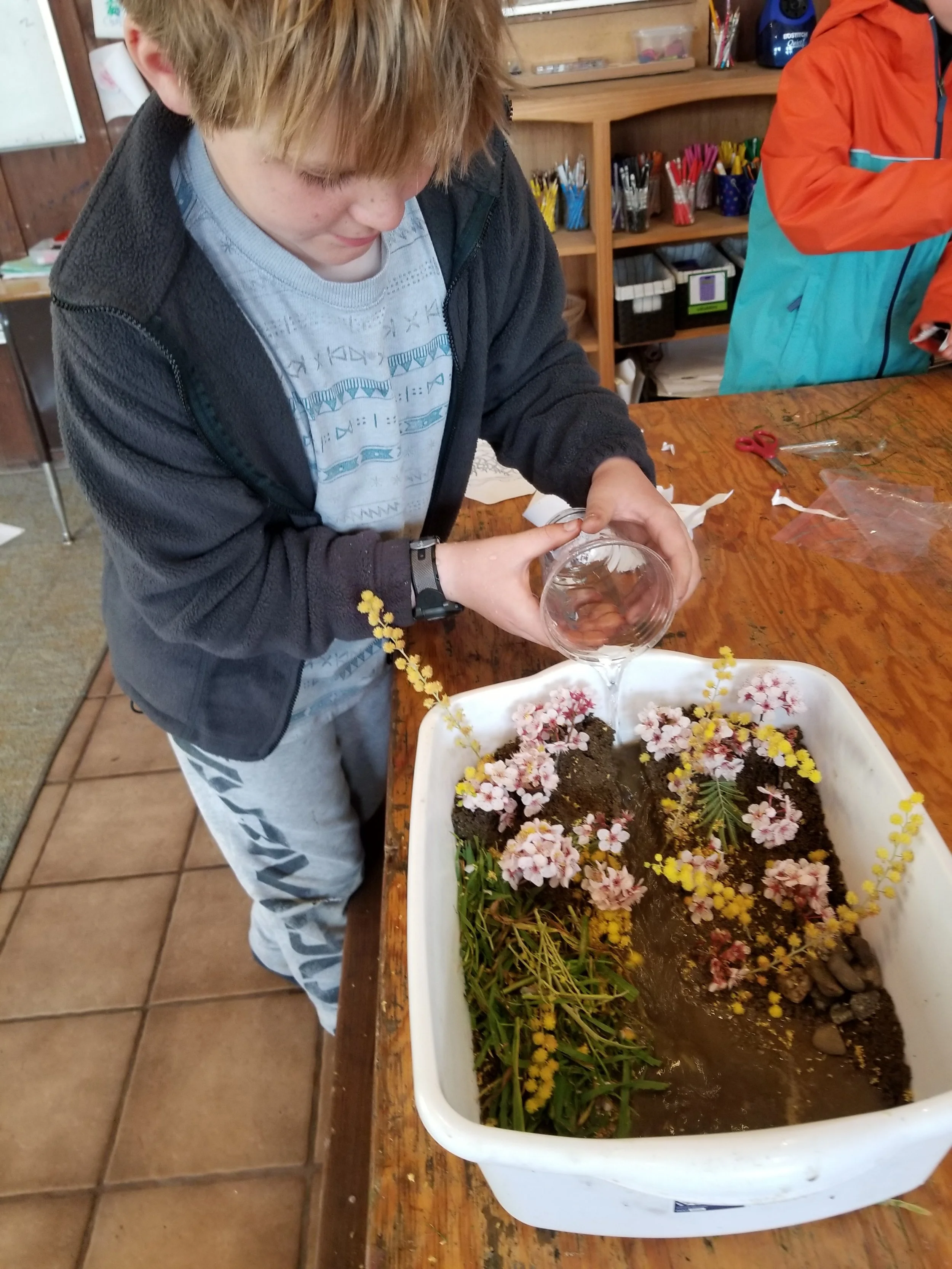 Everett adding water to his model.&nbsp;