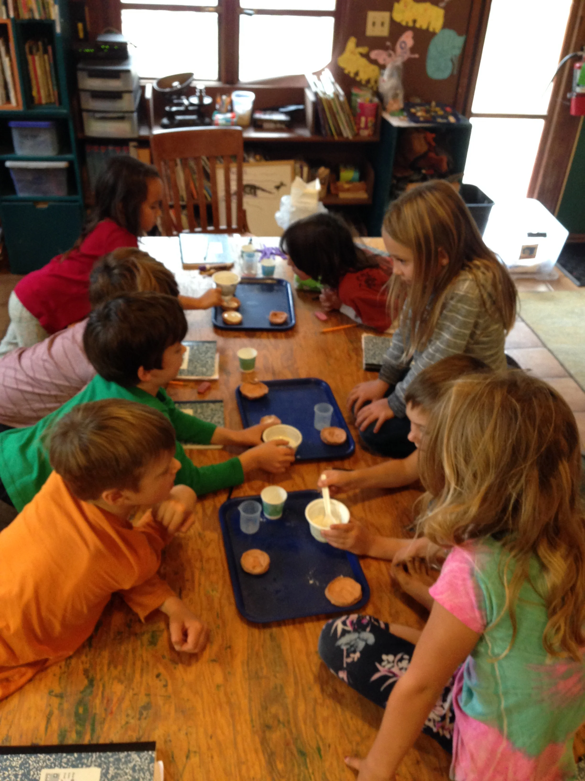 Filling the mold with plaster.
