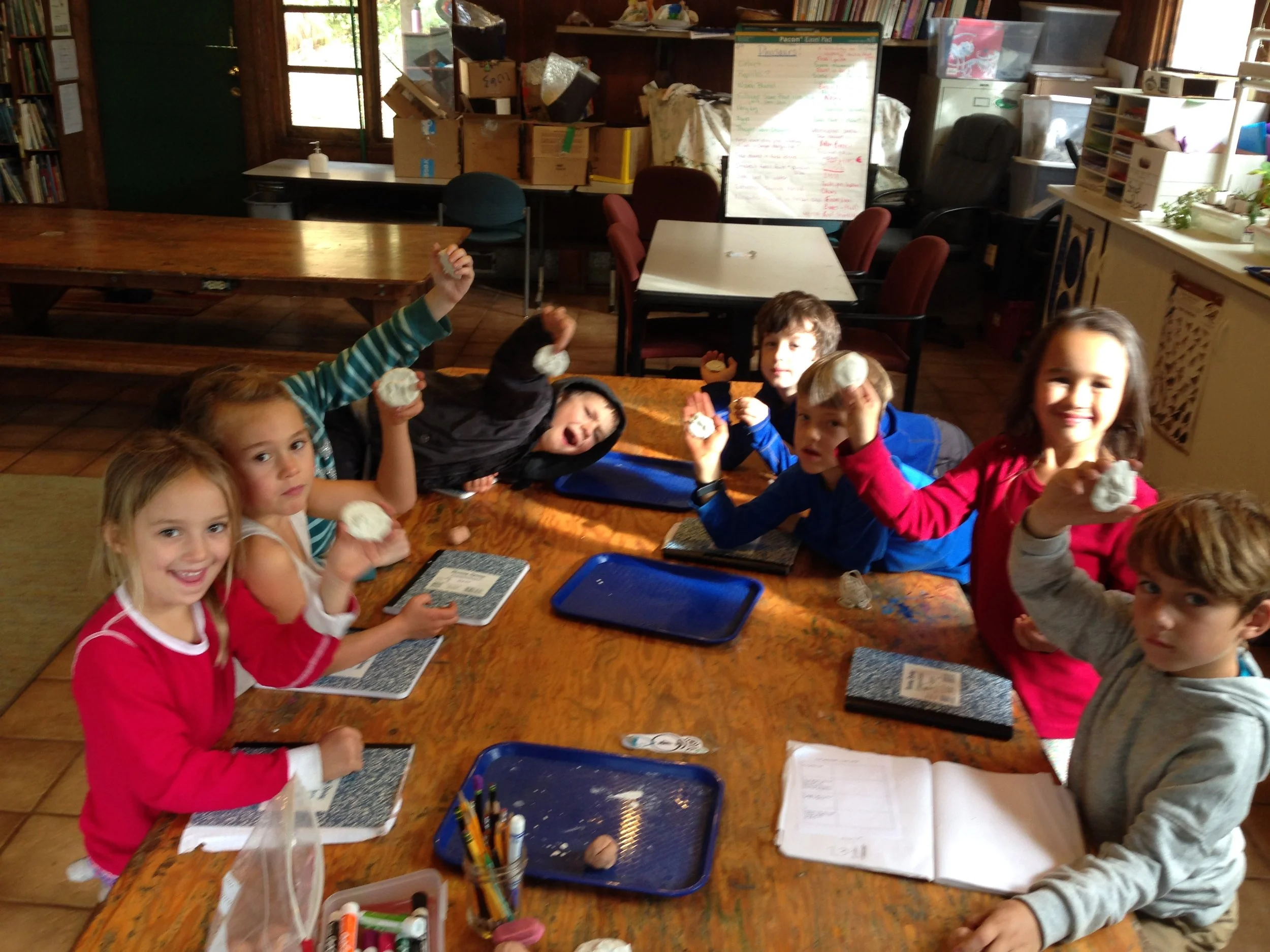 Students displaying their casts.