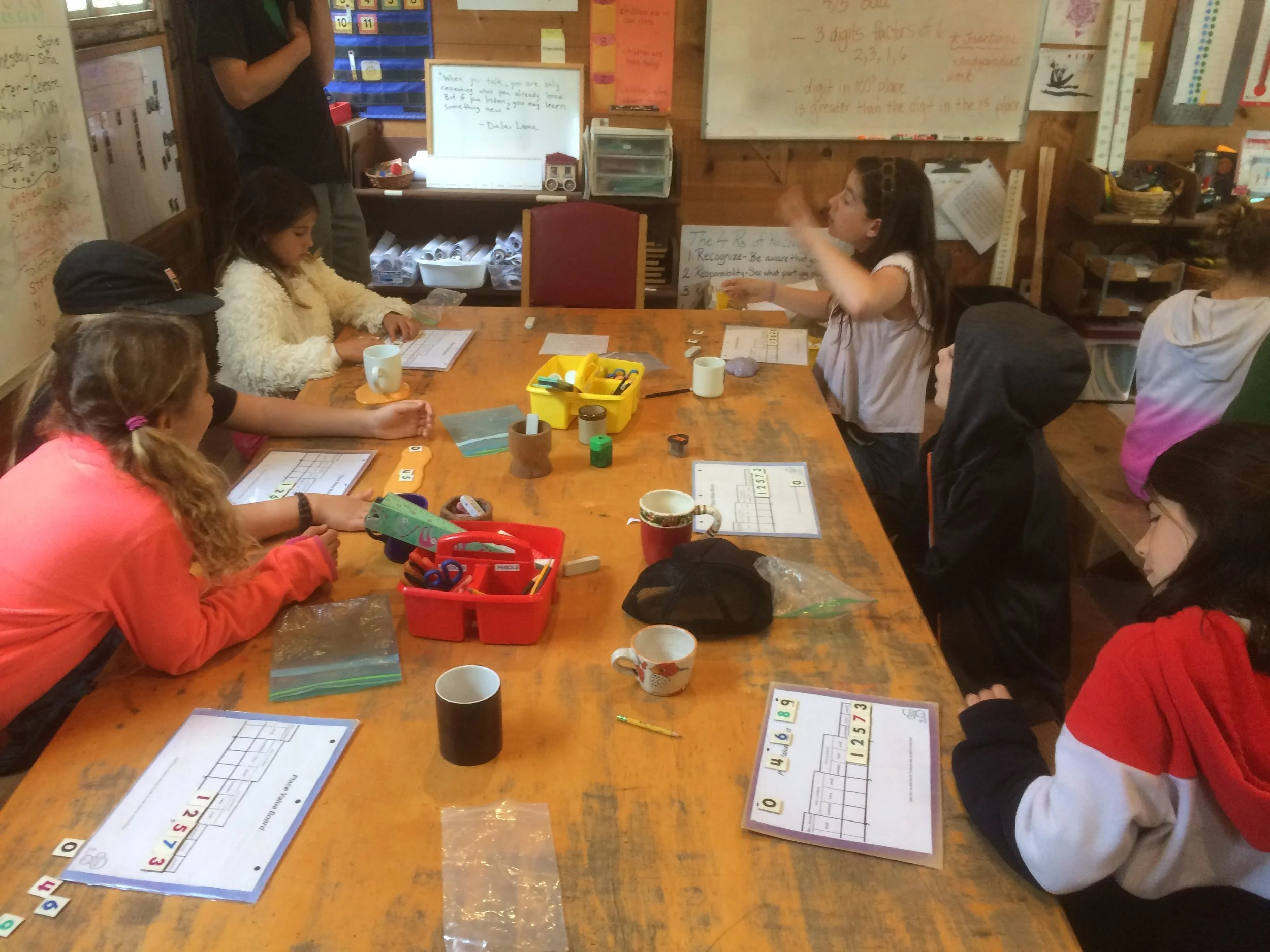 Problem solving the solution to a place value activity, following a set of clues.
