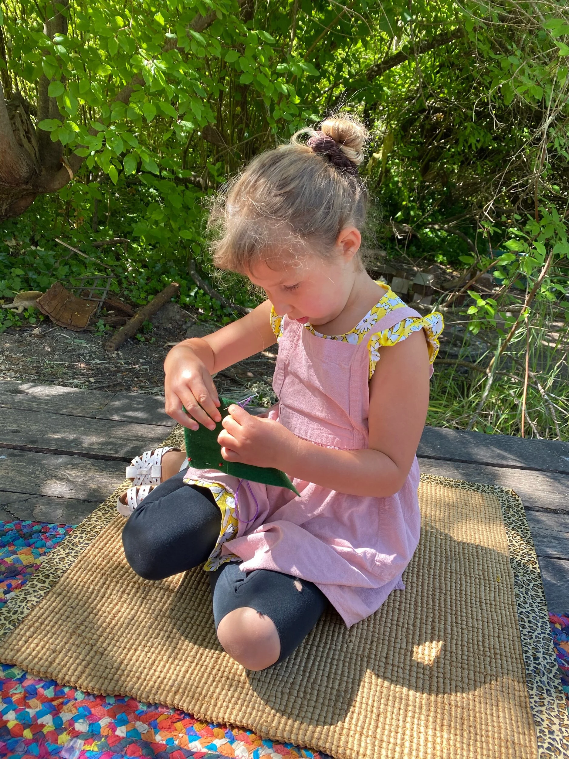 We fit in one more sewing project — the felted bags the kids brought home. They all really got the hang of sewing, my most advanced sewing group ever, I think. They even learned to sew on a button!