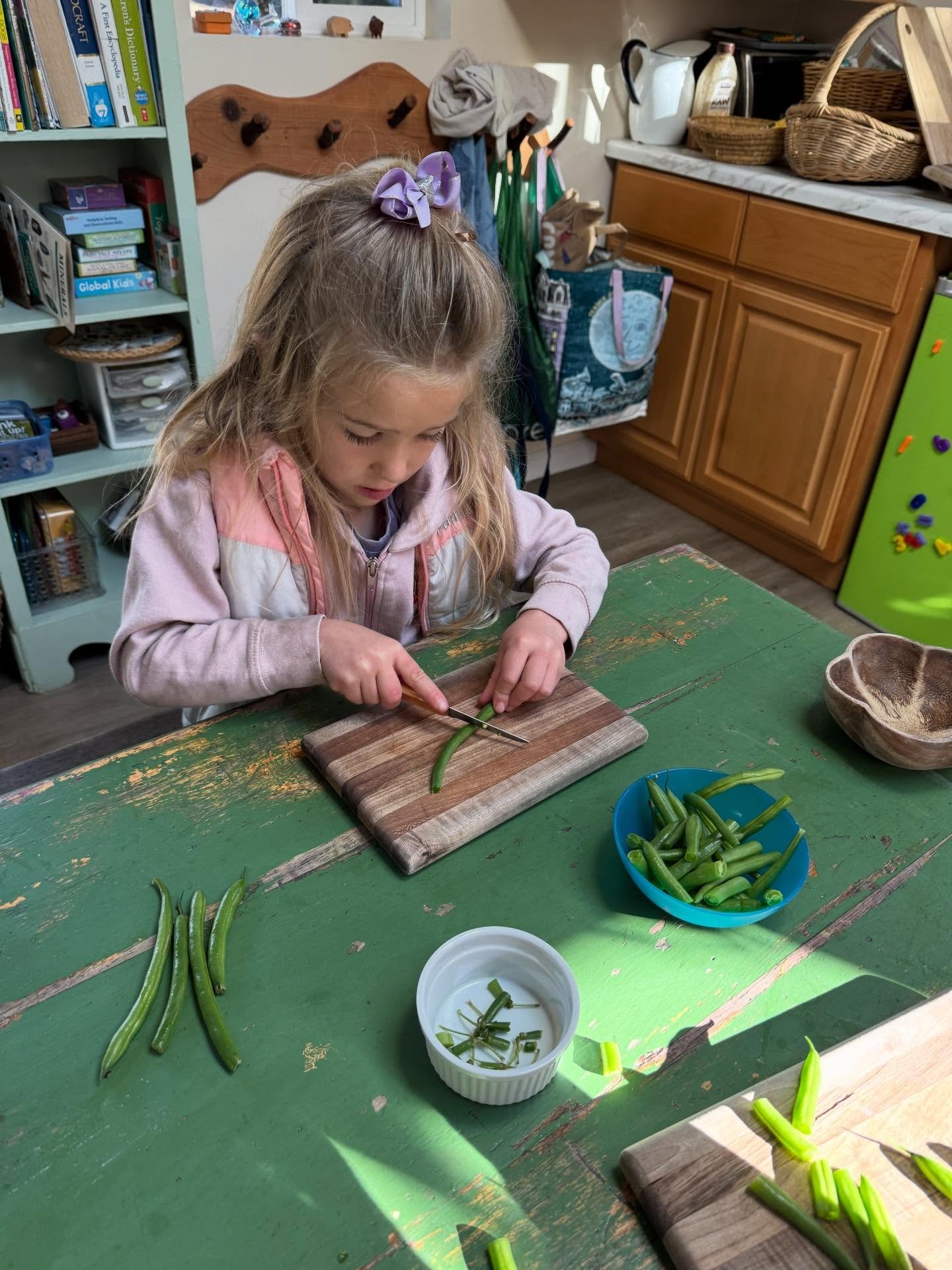 Scenes from our Stone Soup/Thanksgiving Feast Day. Yes, kindergarteners learn to use real knives to cook. No, we don&rsquo;t use real stones for the soup. Yes, we share a story about kindness and then share a scrumptious  feast. Happy Thanksgiving Ev