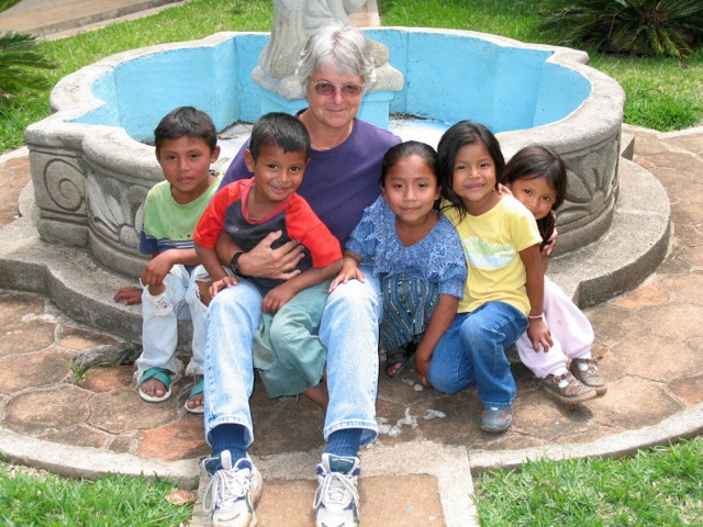 Barb Palari making new friends on a humanitarian aid trip.