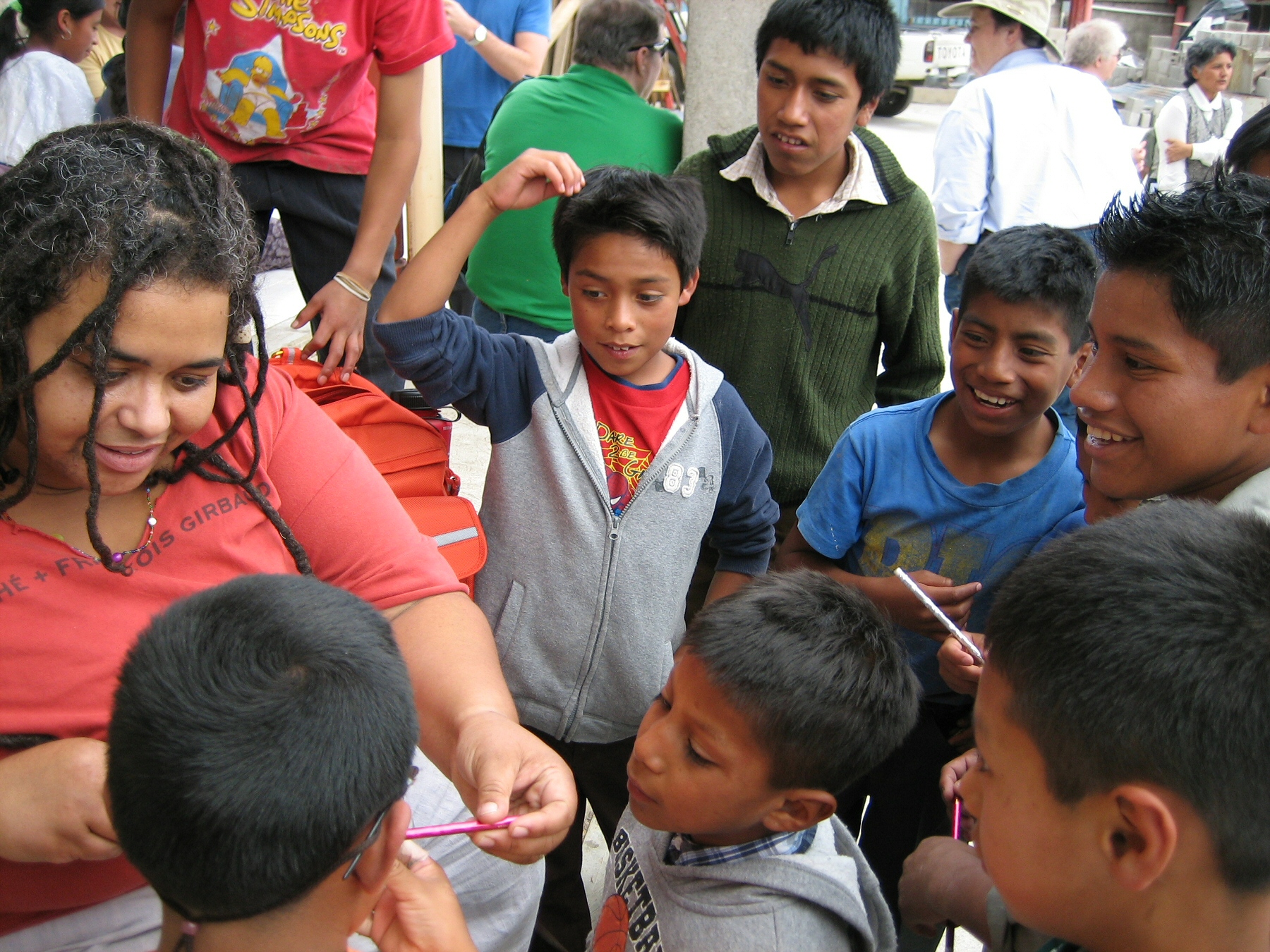 RWF volunteer Amberjoy Leonard visiting children on a humanitarian aid trip.