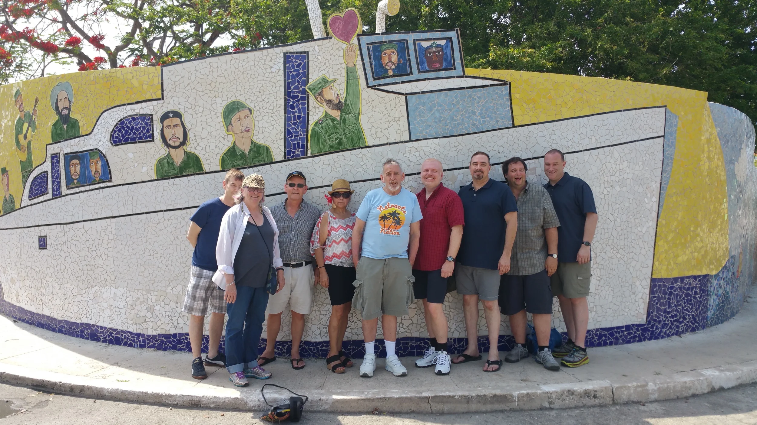 Posing in front of artist Jose Fuster's "Granma" the yacht that launched Fidel and Raul Castro, Che Guevara, Camilo Cienfuegos and 79 fighters at the start of the Revolution (2015)