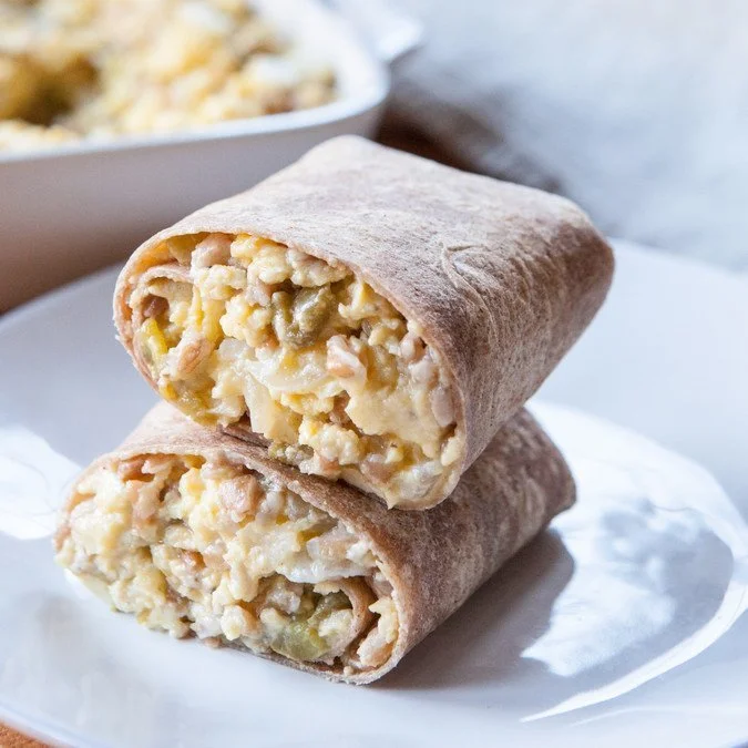 Photo by Megan Gordon. Cheesy Egg, Farro and Green Chile (Freezer) Breakfast Burritos by A Sweet Spoonful. I made a double batch of these and we reheated them in the Breville toaster. They were perfect. Next time I might add some black beans.