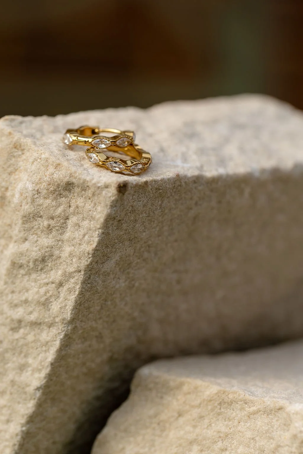 luna-huggie-hoops-on-stone.jpg
