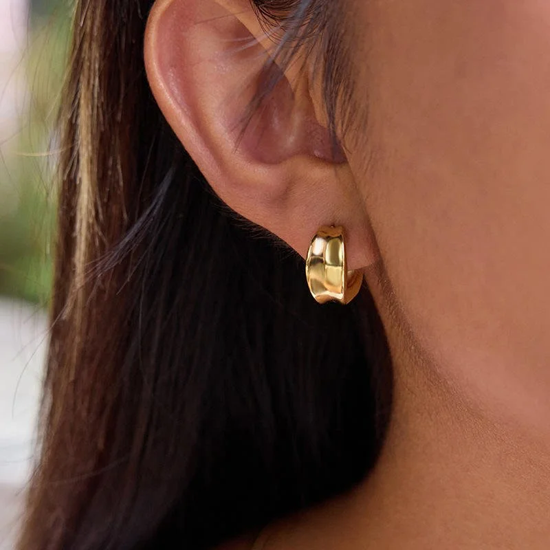 House Thirteen Sculpted Hoop Earrings worn on model, chunky gold sculptural hoop earrings