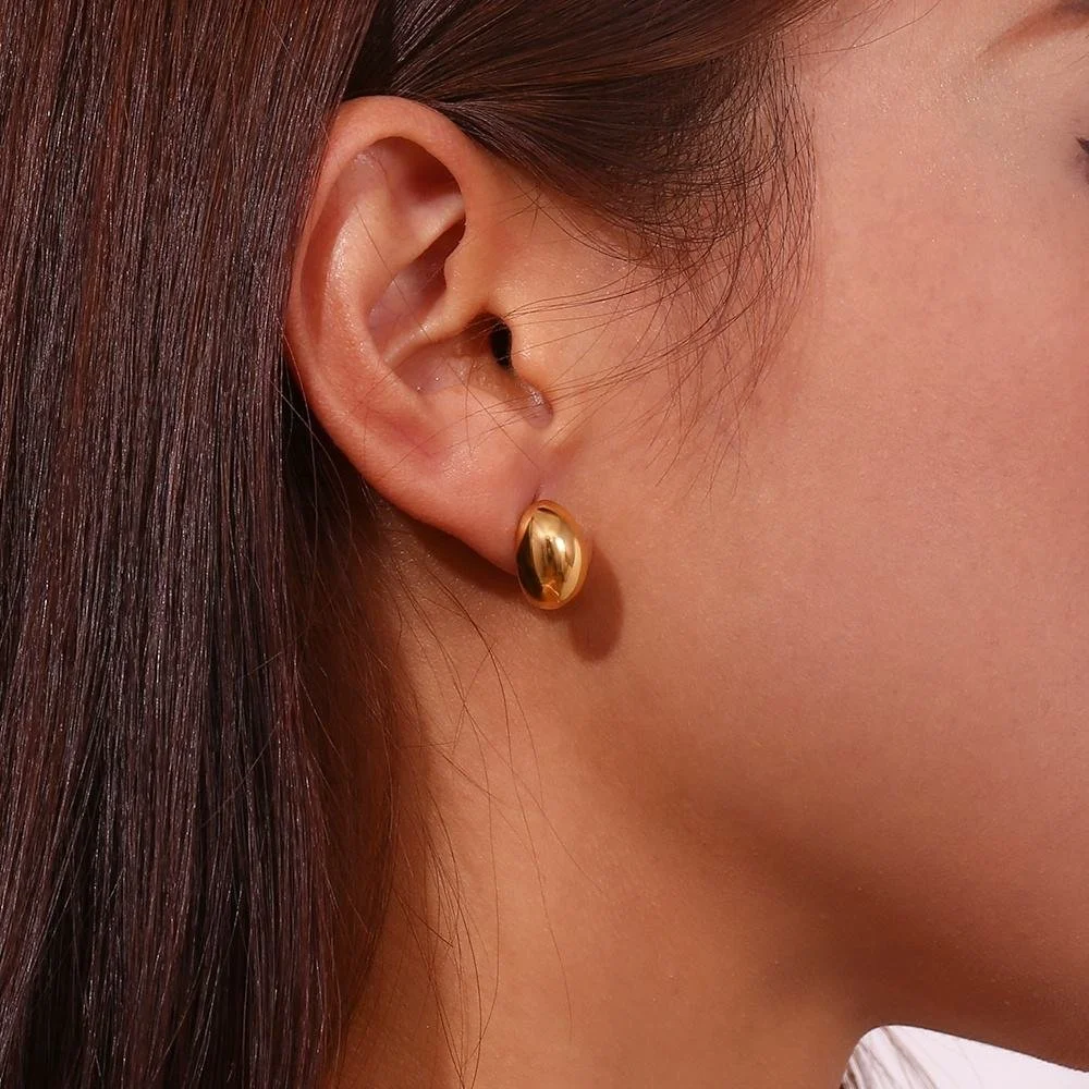 House Thirteen Bubble Stud Earrings worn on model, chunky gold dome stud earrings
