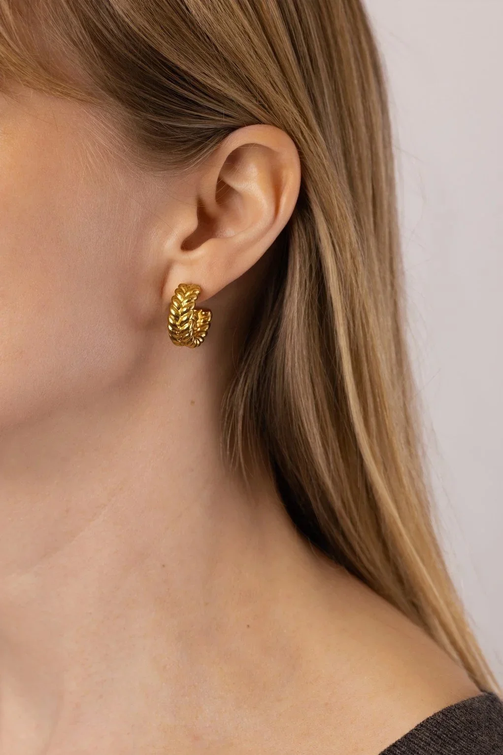 House Thirteen Chunky Braided Hoop Earrings worn on model, textured gold chunky hoop earrings