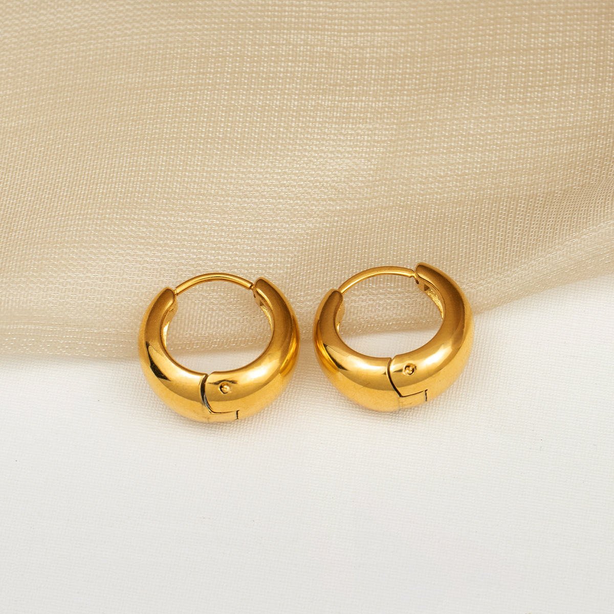 Curve Huggie Earrings
