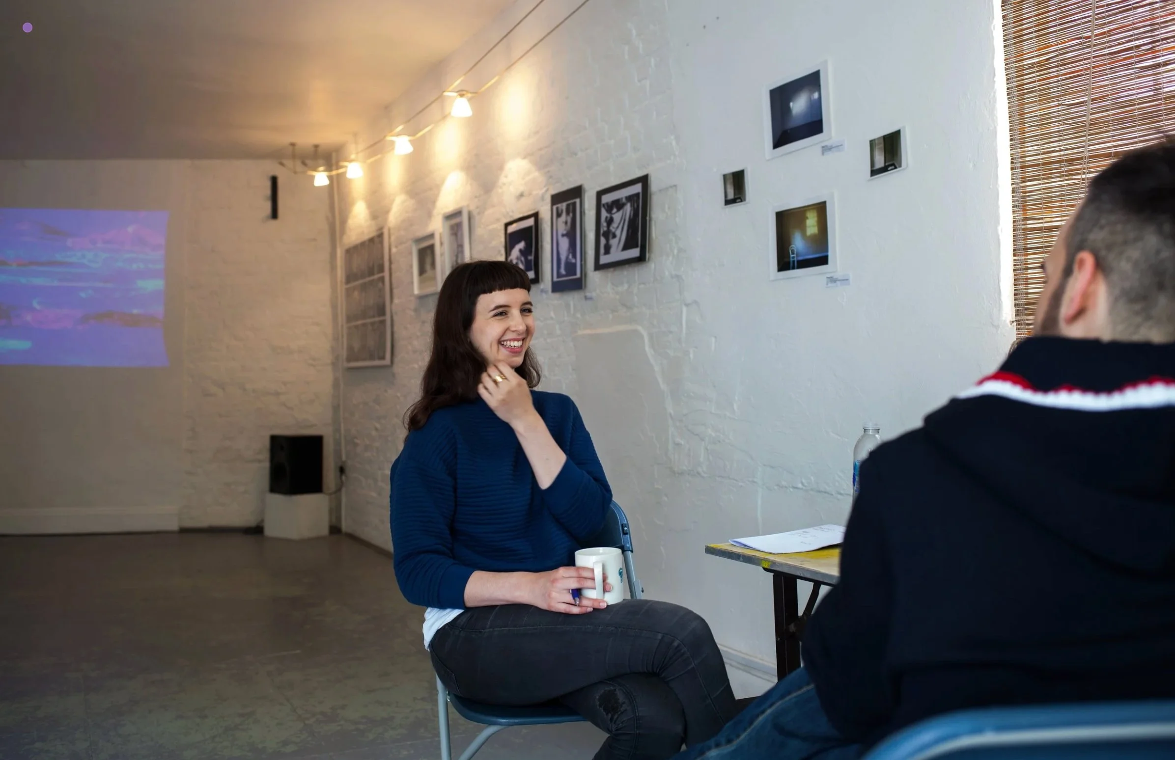 art curator at green lens studios art exhibition