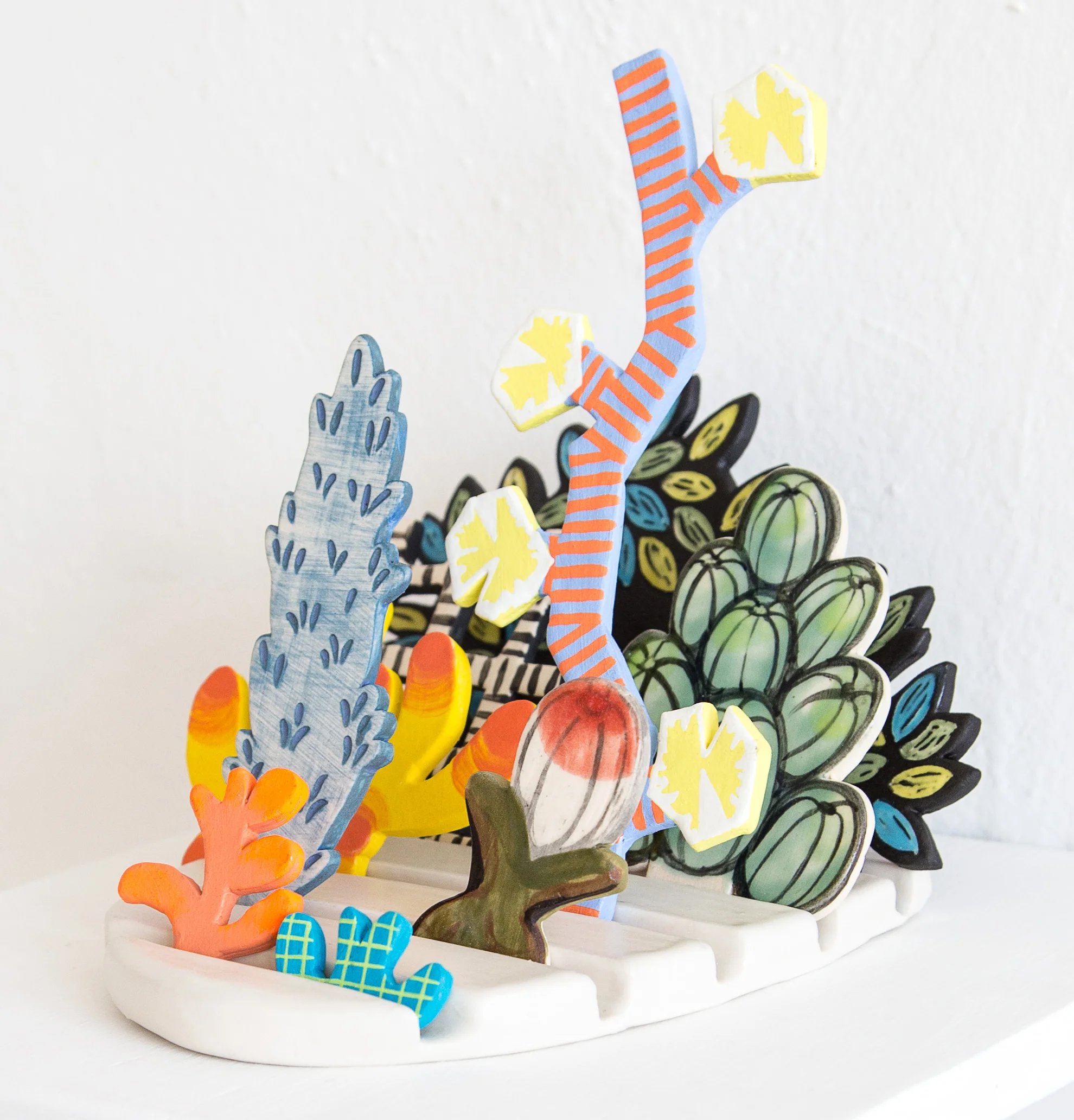 Tender Horizon Porcelain, flashe, wooden shelf; Approximately 5.5 x 7 x 8 inches; 2017