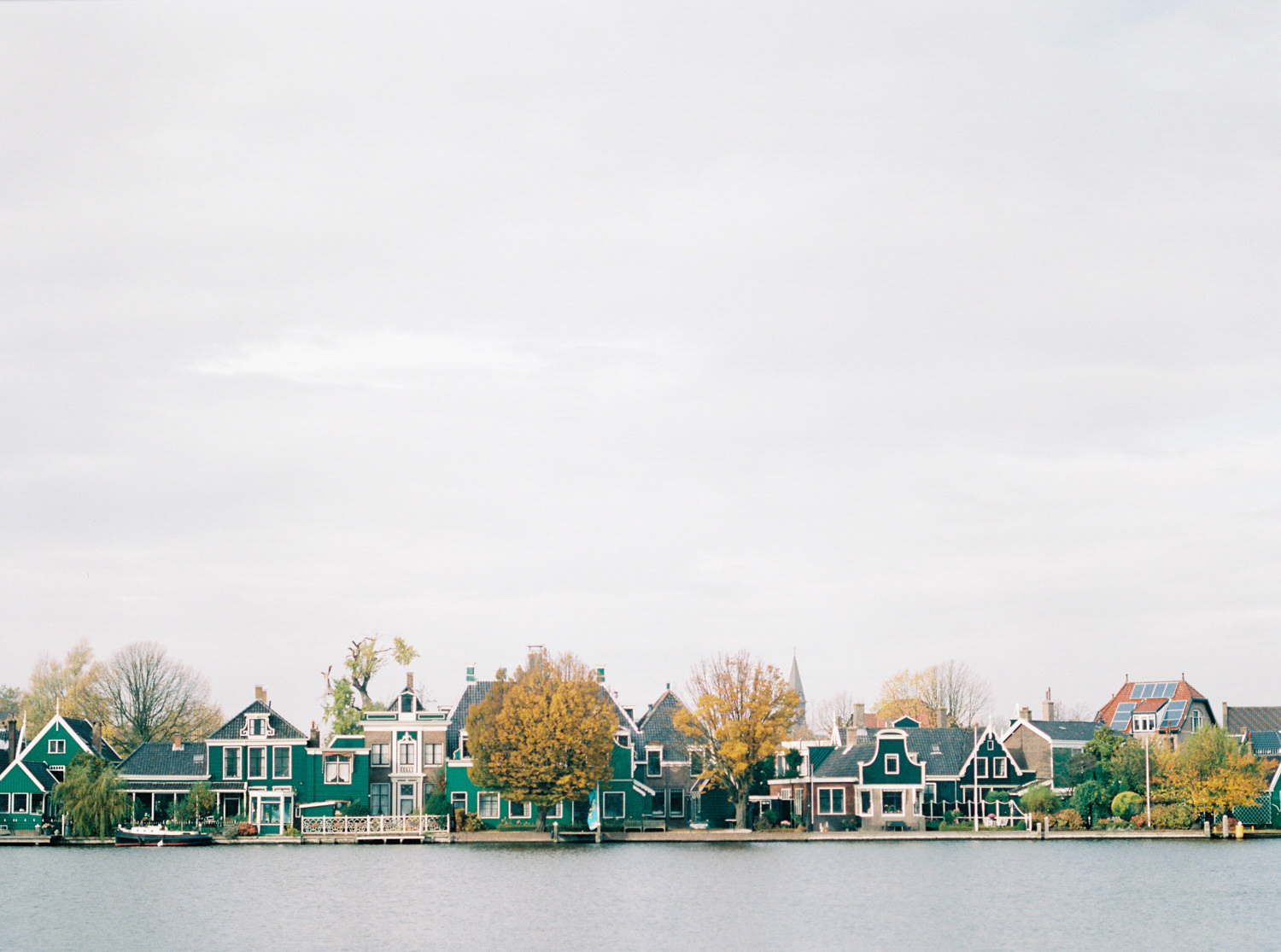 the iconic view of Dutch village Zaanse Schans with its green little houses