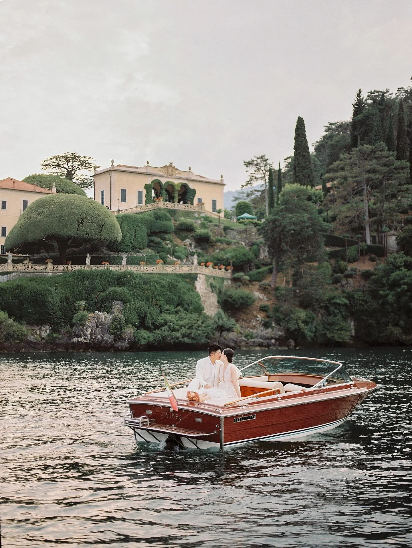 &mdash;
&ldquo;Just now, a moment from years ago: 
  the early morning light, the deft, 
sweet gesture of your hand
  reaching for me.&rdquo;

&mdash;

.
.
.
Lake Como wedding | Lake Como photographer | Lake Como boat photo session | Lake Como prewed
