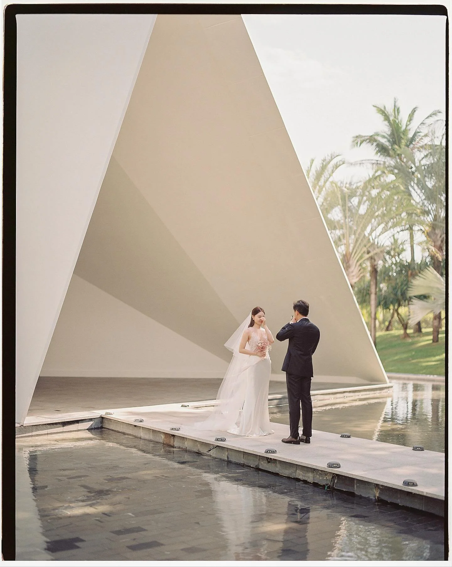 Jiawen &amp; Xian on 6x7 film 🎞️ + Kodak Portra 400

One of the most touching moments was their first look in front of the modern, minimalistic chapel. Serene and romantic.

The vibrant colors of the floral arches adorned at the ceremony.

The lush 