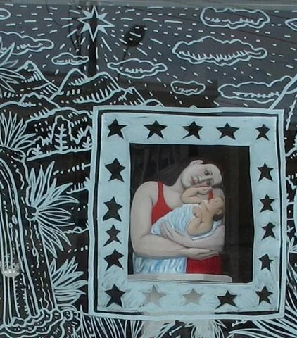 Christmas shop window. Mother and Child by Louise Rive.