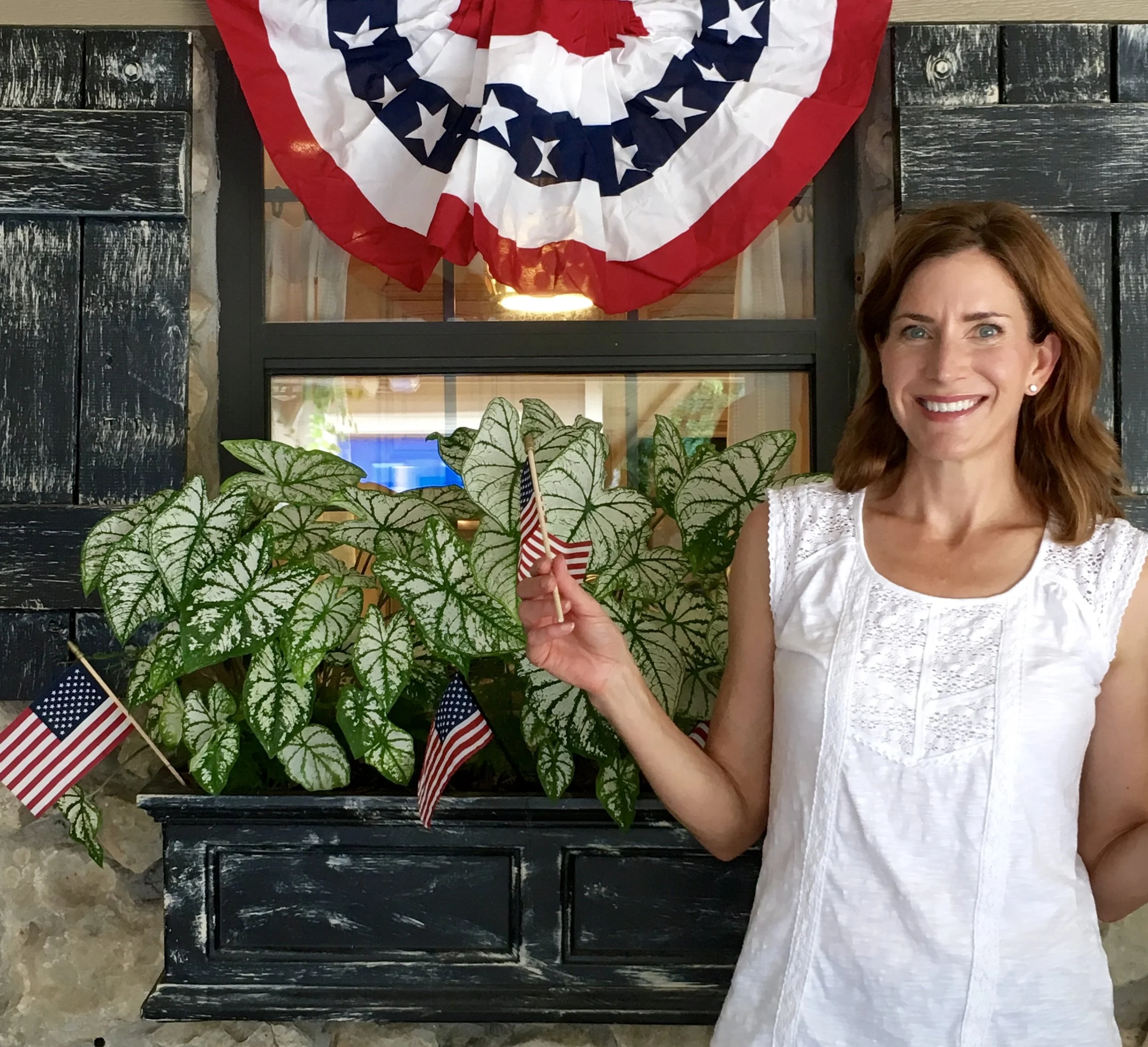 Cheers to the red, white and blue! One of our favorite holidays, the 4th of July, is right around the corner. Whether you are hosting a gathering of friends and family to celebrate this important day for our nation or just want to show some patriotic spirit, here a few super easy tips to get your outdoor space looking festive. Flags, flags and more flags! Nothing says "Happy 4th" more than our beloved American flag waving in the breeze. You can find flags in all different sizes to use in outdoor planters of all shapes and sizes. We are big fans of tucking in lots of mini-flags into the sides of our pots. We'll let you in on a little secret. We're obsessed with flag bunting! The bunting in this picture is 3 feet wide and 1.5 feet long - the perfect size for many windows. But wait, there's more. Don't stop with flags and bunting...throw some red, white and blue pillows on your front porch bench and outdoor furniture. Now you're set! It's so easy right? You even have time to whip up the mother of all 4th of July desserts, the patriotic classic...FLAG CAKE! Happy 4th friends!